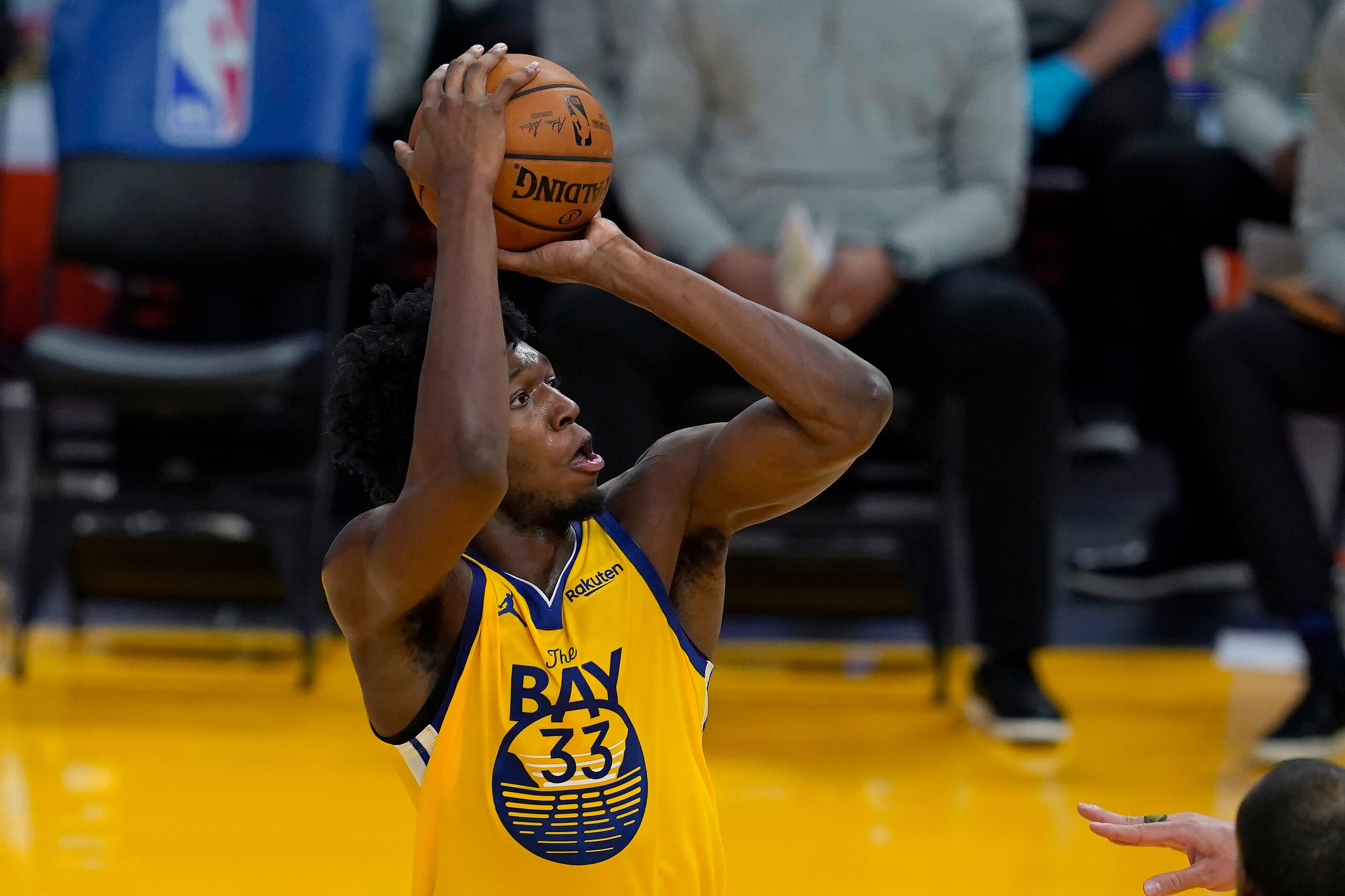 Golden State Warriors center James Wiseman (33) shoots against the Milwaukee Bucks during the first half of an NBA basketball game in San Francisco, Tuesday, April 6, 2021. (AP Photo/Jeff Chiu)