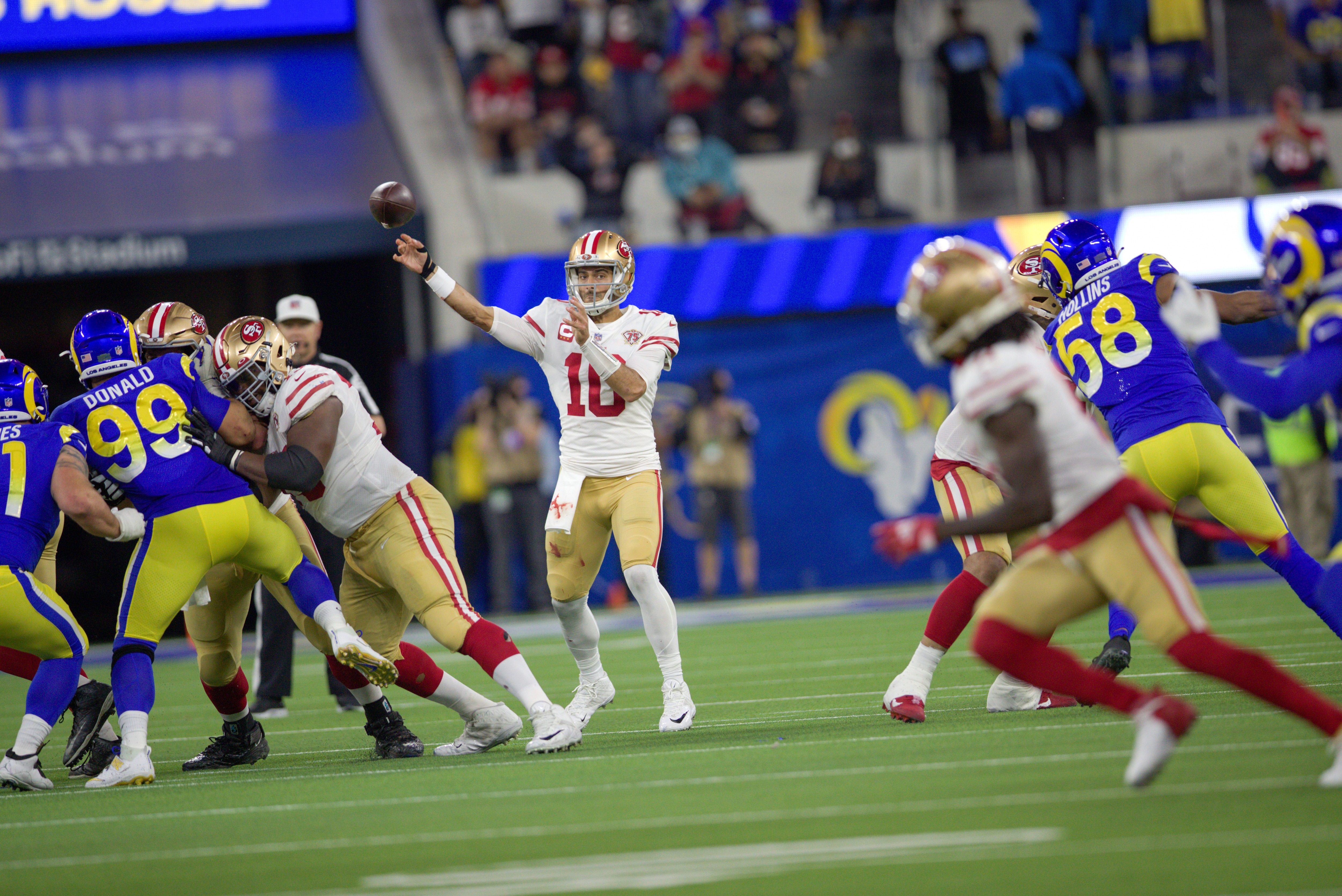 INGLEWOOD, CA - JANUARY 30: Jimmy Garoppolo #10 of the San Francisco 49ers passes during the game against the Los Angeles Rams at SoFi Stadium on January 30, 2022 in Inglewood, California. The Rams defeated the 49ers 20-17. (Photo by Michael Zagaris/San Francisco 49ers/Getty Images)