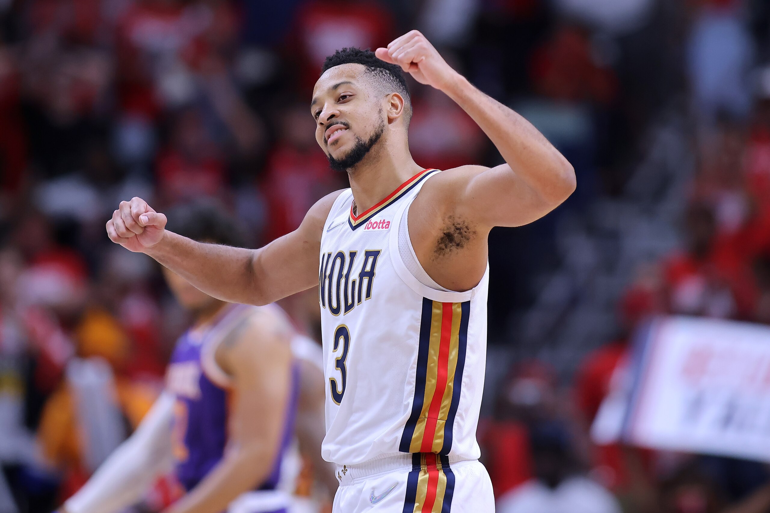 NEW ORLEANS, LOUISIANA - APRIL 24: CJ McCollum #3 of the New Orleans Pelicans reacts against the Phoenix Suns during Game Four of the Western Conference First Round NBA Playoffs at the Smoothie King Center on April 24, 2022 in New Orleans, Louisiana. NOTE TO USER: User expressly acknowledges and agrees that, by downloading and or using this Photograph, user is consenting to the terms and conditions of the Getty Images License Agreement. (Photo by Jonathan Bachman/Getty Images)
