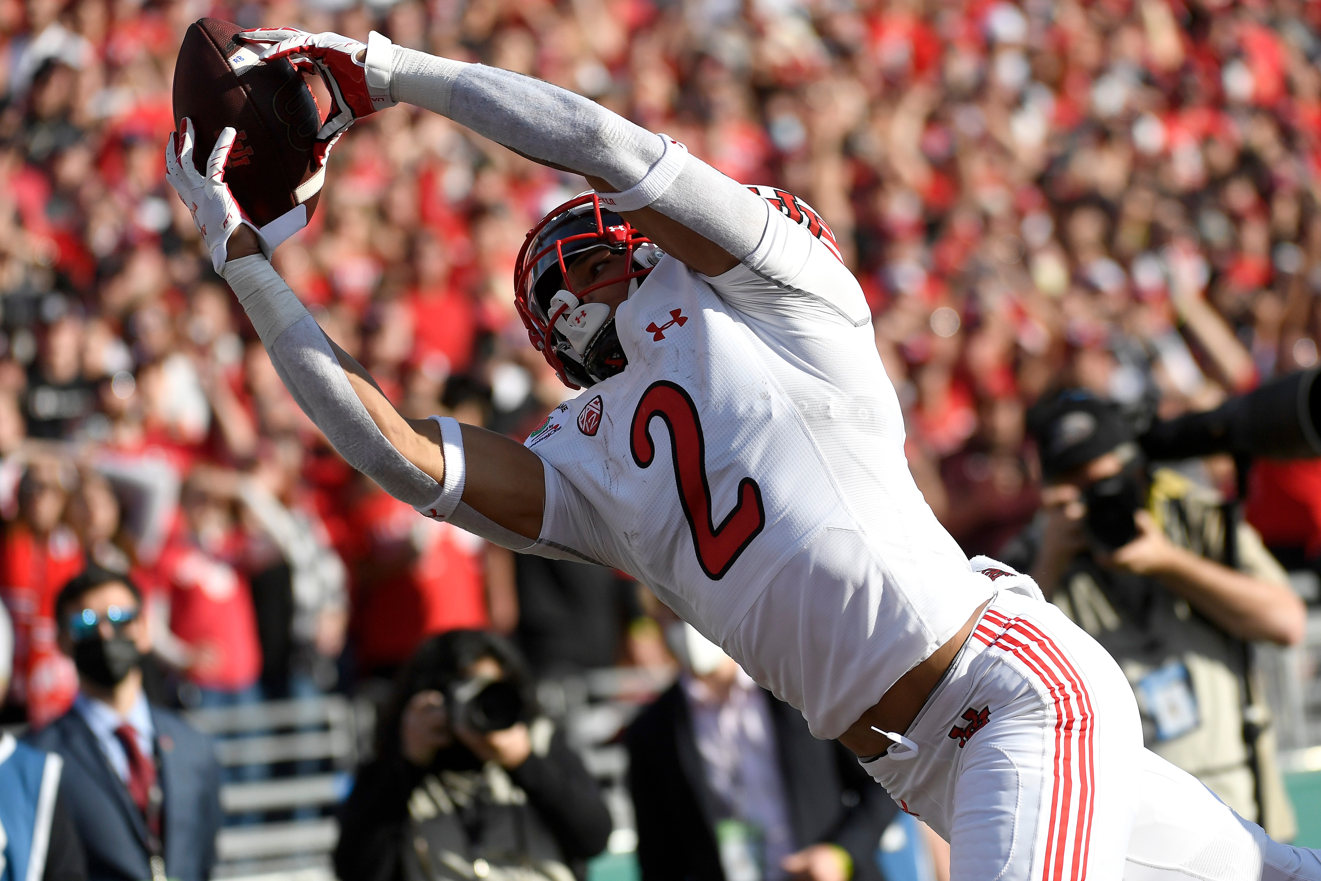 PASADENA, CALIFORNIA - JANUARY 01: Micah Bernard #2 of the Utah Utes catches a touchdown pass against the Ohio State Buckeyes during the first quarter in the Rose Bowl Game at Rose Bowl Stadium on January 01, 2022 in Pasadena, California. (Photo by Kevork Djansezian/Getty Images)