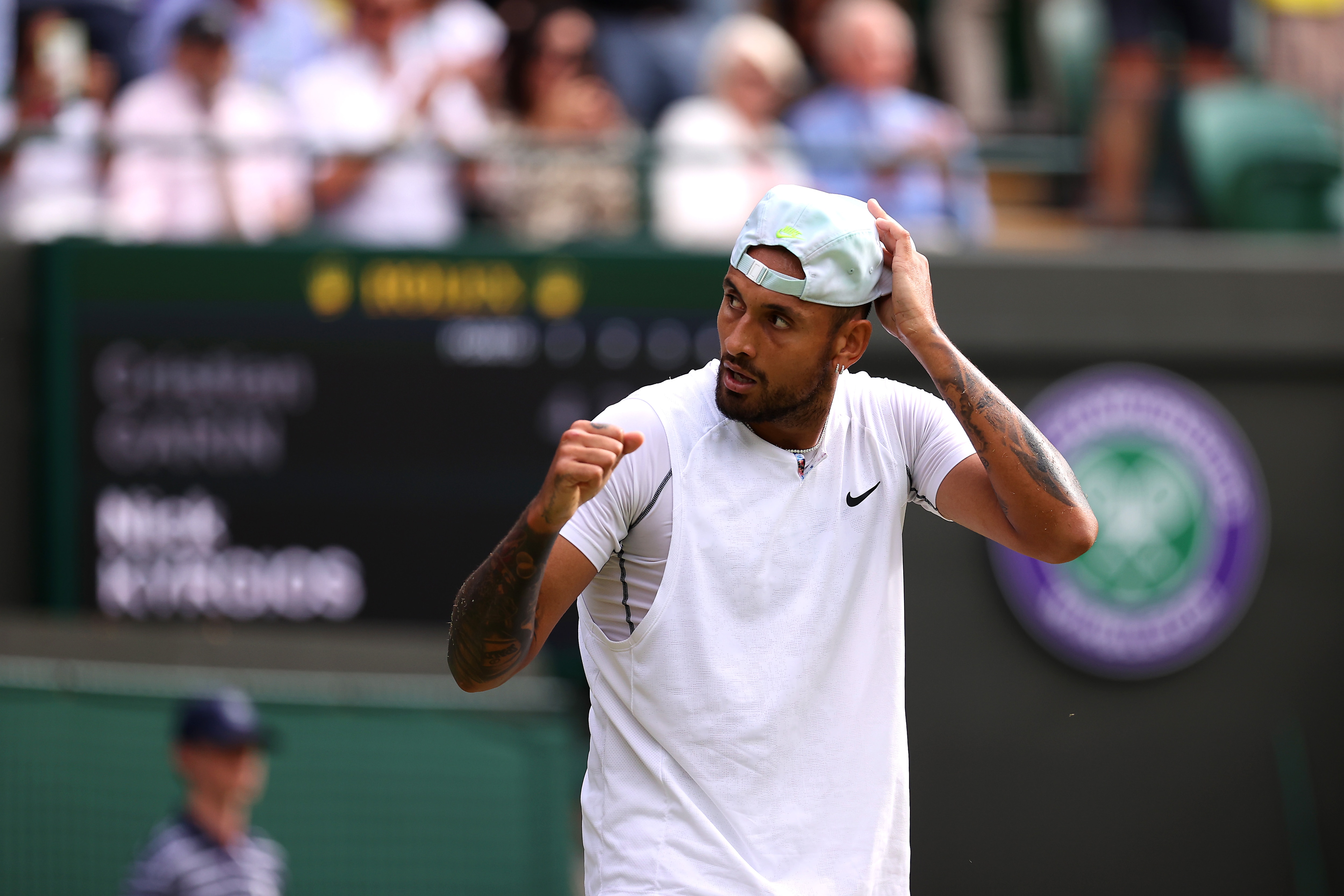 LONDON, ENGLAND - JULY 06: Nick Kyrgios of Australia celebrates winning the match against Cristian Garin of Chile during their Men's Singles Quarter Final match on day ten of The Championships Wimbledon 2022 at All England Lawn Tennis and Croquet Club on July 06, 2022 in London, England. (Photo by Ryan Pierse/Getty Images)