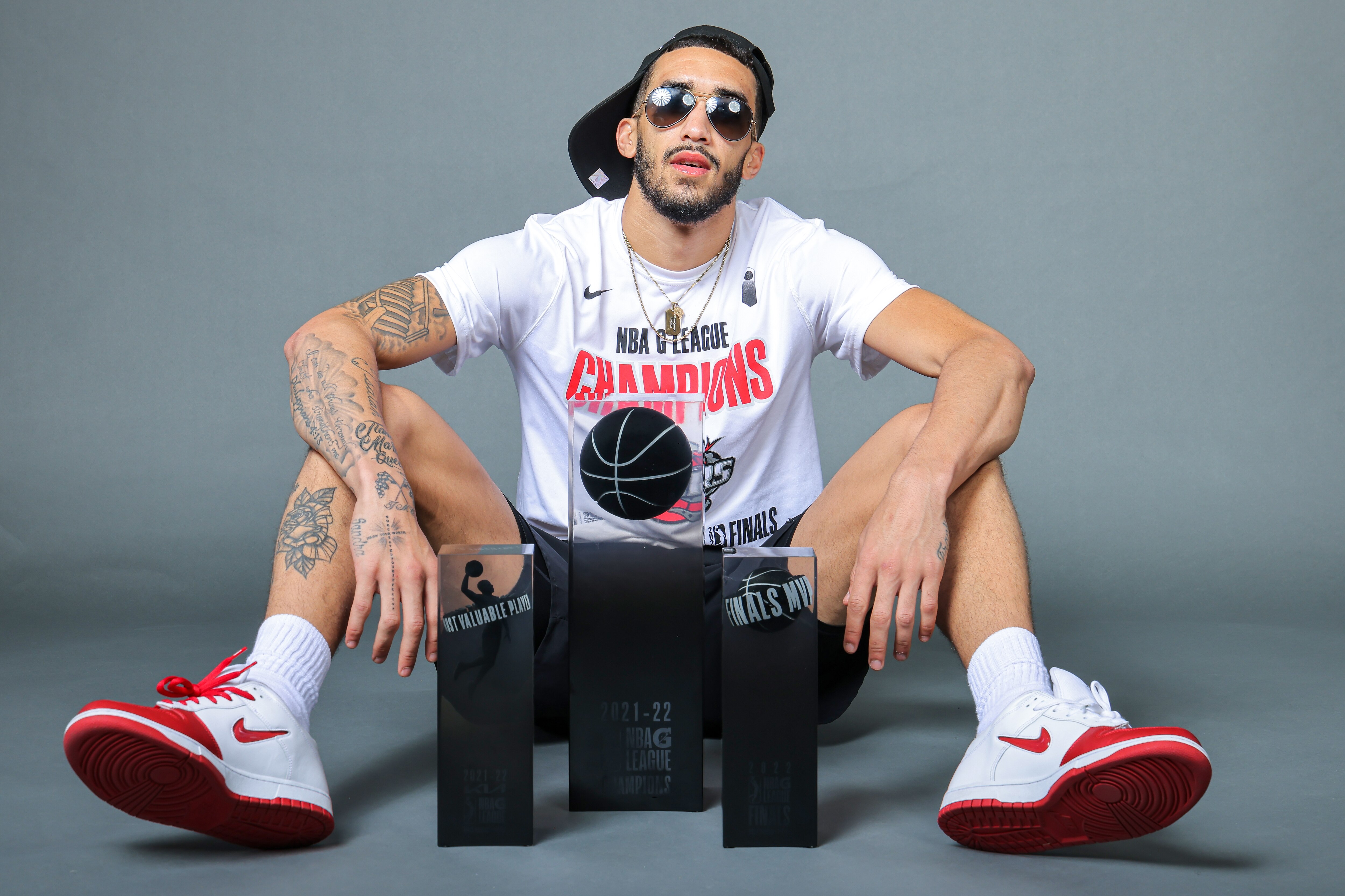 EDINBURG, TX - APRIL16: Trevelin Queen #21 of the Rio Grande Valley Vipers poses for a portrait with the 2021-22 G League Championship Trophy on April 16, 2022 at the Bert Ogden Arena in Edinburg, Texas. NOTE TO USER: User expressly acknowledges and agrees that, by downloading and or using this Photograph, user is consenting to the terms and conditions of the Getty Images License Agreement. Mandatory Copyright Notice: Copyright 2022 NBAE (Photo by Christian Inoferio/NBAE via Getty Images)