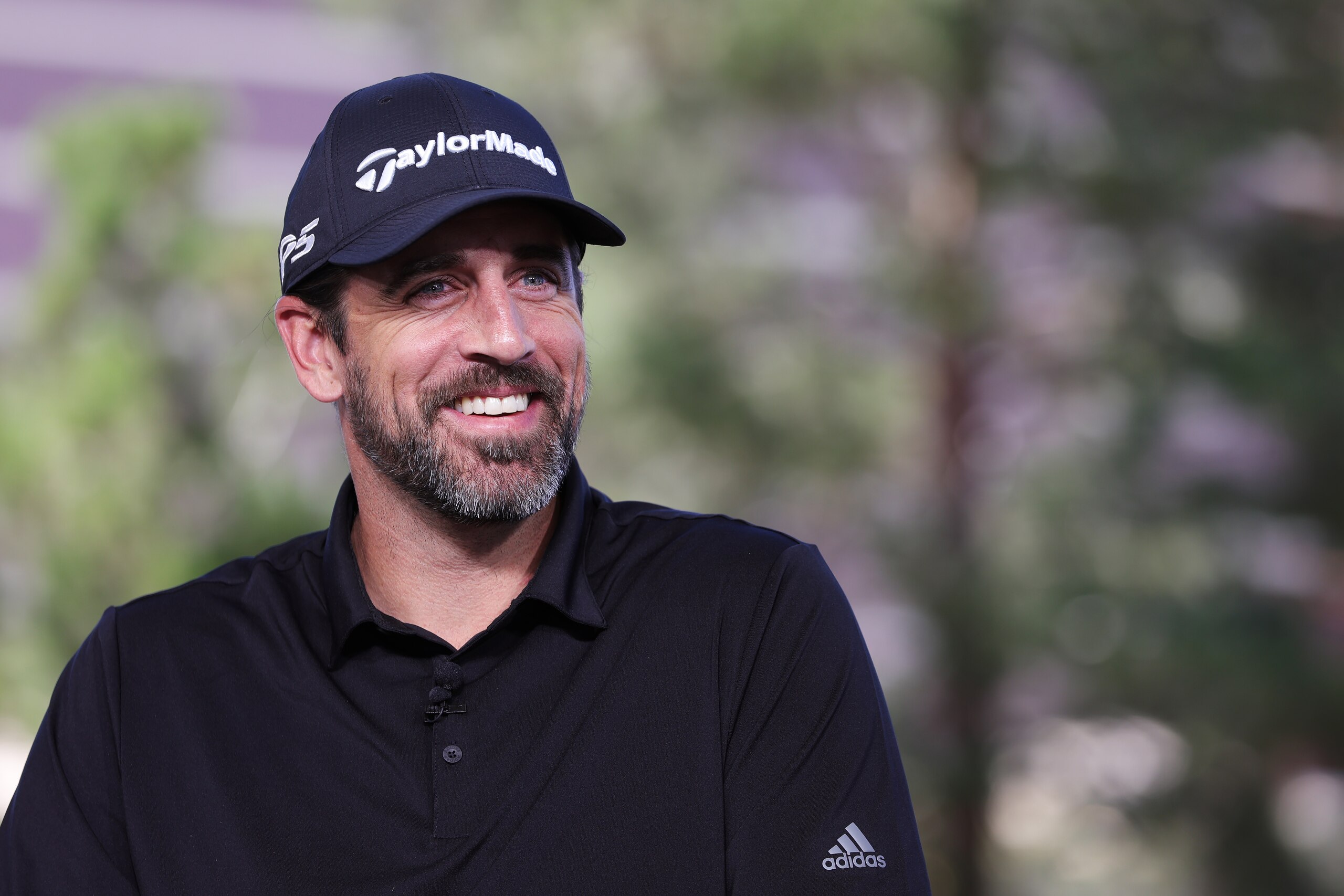 LAS VEGAS, NEVADA - JUNE 01: Aaron Rodgers takes part in the Bleacher Report Hot Seat Press Conference prior to Capital One's The Match VI - Brady & Rodgers v Allen & Mahomes at Wynn Golf Club on June 01, 2022 in Las Vegas, Nevada. (Photo by Carmen Mandato/Getty Images for The Match)