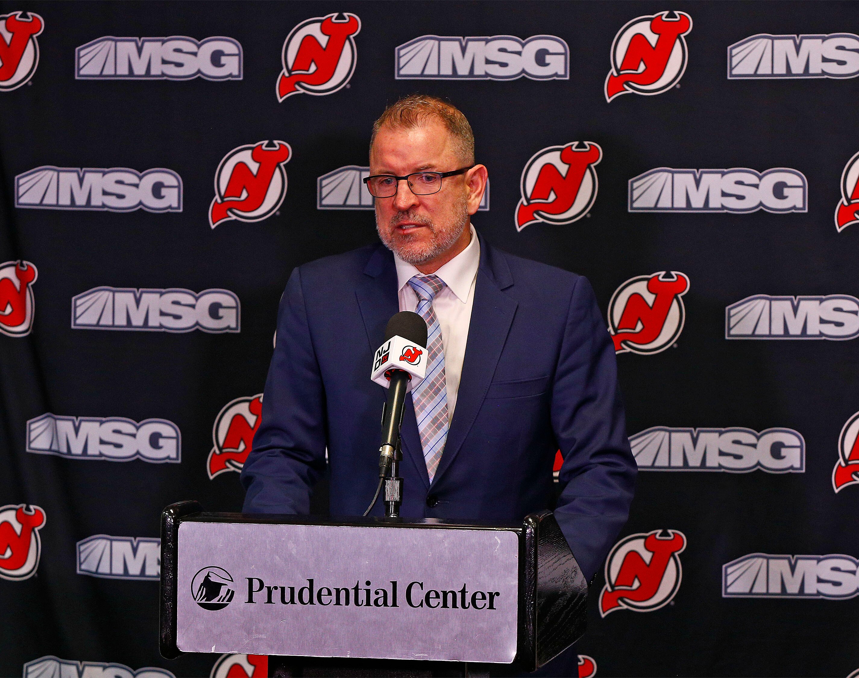NEWARK, NJ - NOVEMBER 30: New Jersey Devils general manager Tom Fitzgerald addresses the media announcing the contract extension for Jack Hughes #86 prior to the game against the San Jose Sharks at the Prudential Center on November 30, 2021 in Newark, New Jersey. (Photo by Andy Marlin/NHLI via Getty Images) NEWARK, NJ - NOVEMBER 30: New Jersey Devils general manager Tom Fitzgerald addresses the media announcing the contract extension for Jack Hughes #86 prior to the game against the San Jose Sharks at the Prudential Center on November 30, 2021 in Newark, New Jersey. (Photo by Andy Marlin/NHLI via Getty Images)