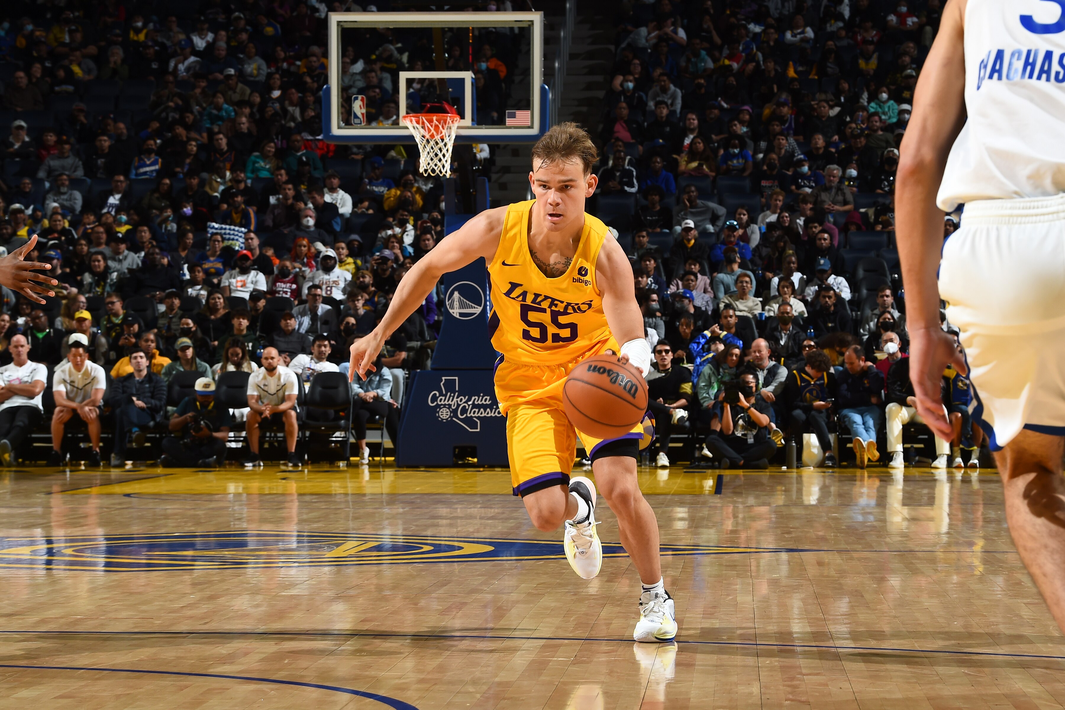 SAN FRANCISCO, CA - JULY 3:  Mac McClung #55 of Los Angeles Lakers handles the ball during the  2022 California  Class  against the Golden State Warriors  during the 2022  Salt Lake City Summer League on July 3, 2022 at Chase Center in San Francisco, California. NOTE TO USER: User expressly acknowledges and agrees that, by downloading and or using this photograph, user is consenting to the terms and conditions of Getty Images License Agreement. Mandatory Copyright Notice: Copyright 2022 NBAE (Photo by Noah Graham/NBAE via Getty Images)