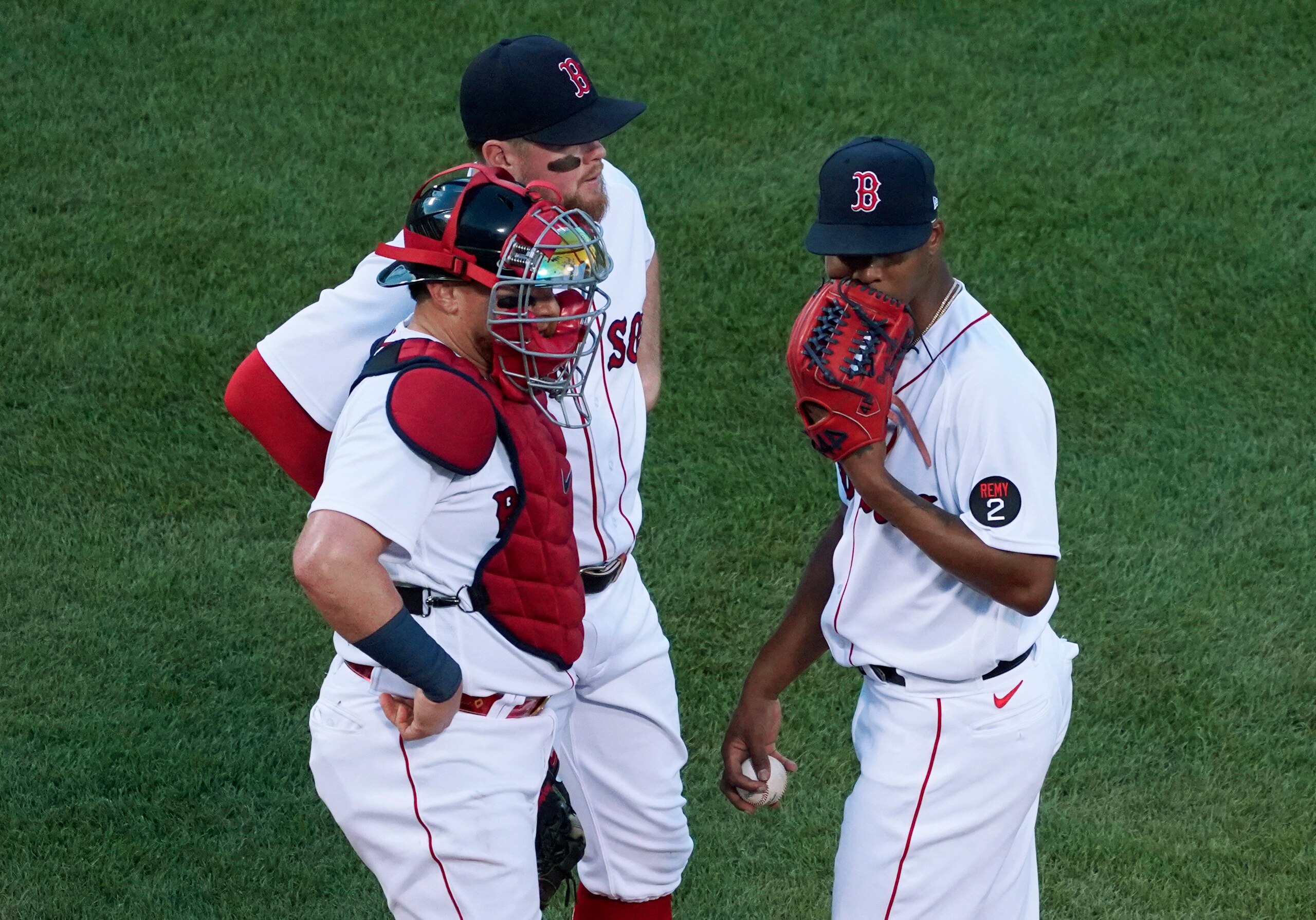 Boston Red Sox starting pitcher Brayan Bello, right, talks with catcher Christian Vazquez and third baseman Christian Arroyo between Tampa Bay Rays batters during the third inning of a baseball game at Fenway Park, Wednesday, July 6, 2022, in Boston. (AP Photo/Mary Schwalm) Boston Red Sox starting pitcher Brayan Bello, right, talks with catcher Christian Vazquez and third baseman Christian Arroyo between Tampa Bay Rays batters during the third inning of a baseball game at Fenway Park, Wednesday, July 6, 2022, in Boston. (AP Photo/Mary Schwalm)