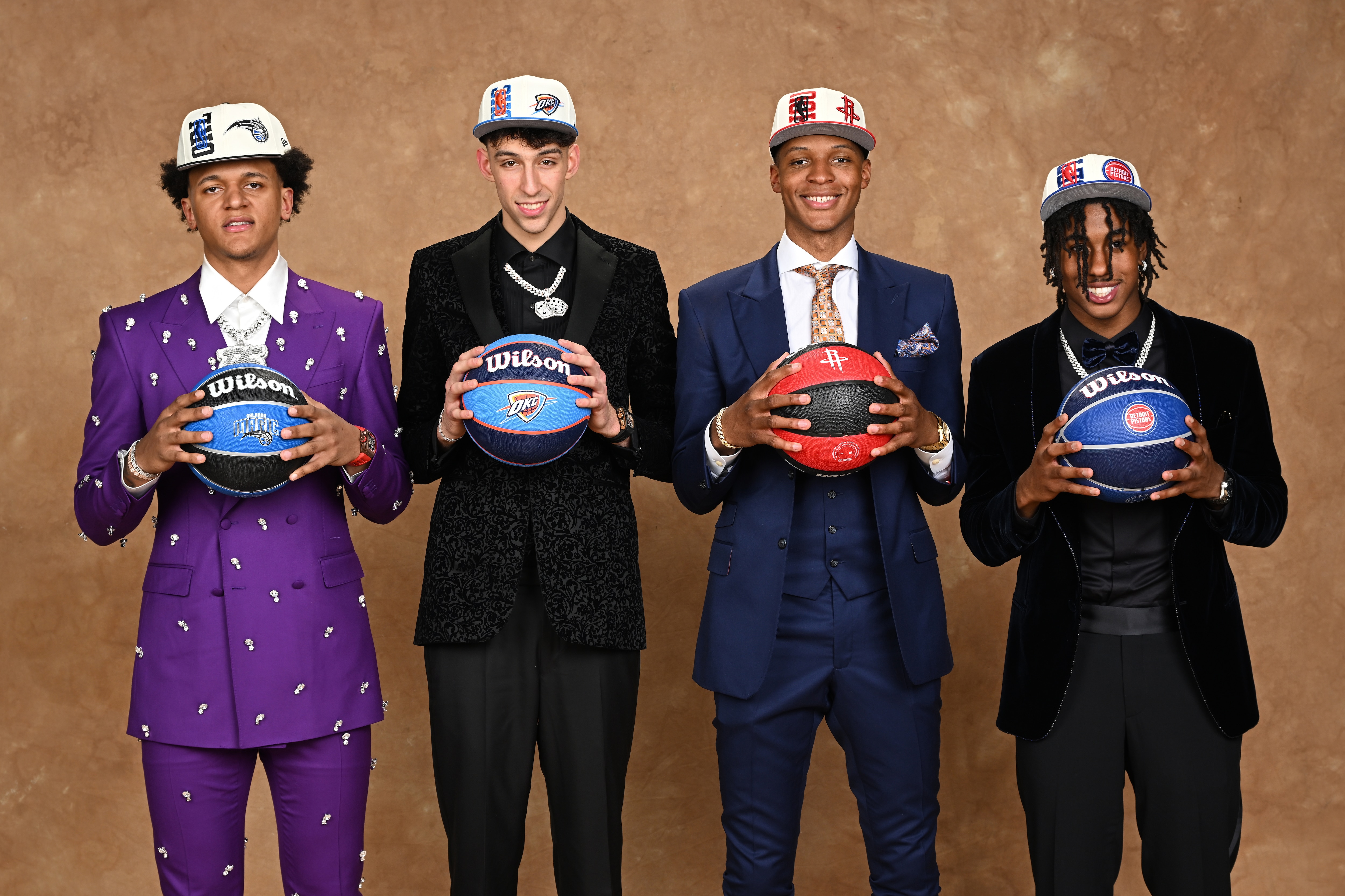 BROOKLYN, NY - JUNE 23: Jabari Smith, Paolo Banchero and Chet Holmgren pose for a portrait after being drafted during the 2022 NBA Draft on June 23, 2022 at Barclays Center in Brooklyn, New York. NOTE TO USER: User expressly acknowledges and agrees that, by downloading and or using this photograph, User is consenting to the terms and conditions of the Getty Images License Agreement. Mandatory Copyright Notice: Copyright 2022 NBAE (Photo by Jennifer Pottheiser/NBAE via Getty Images)