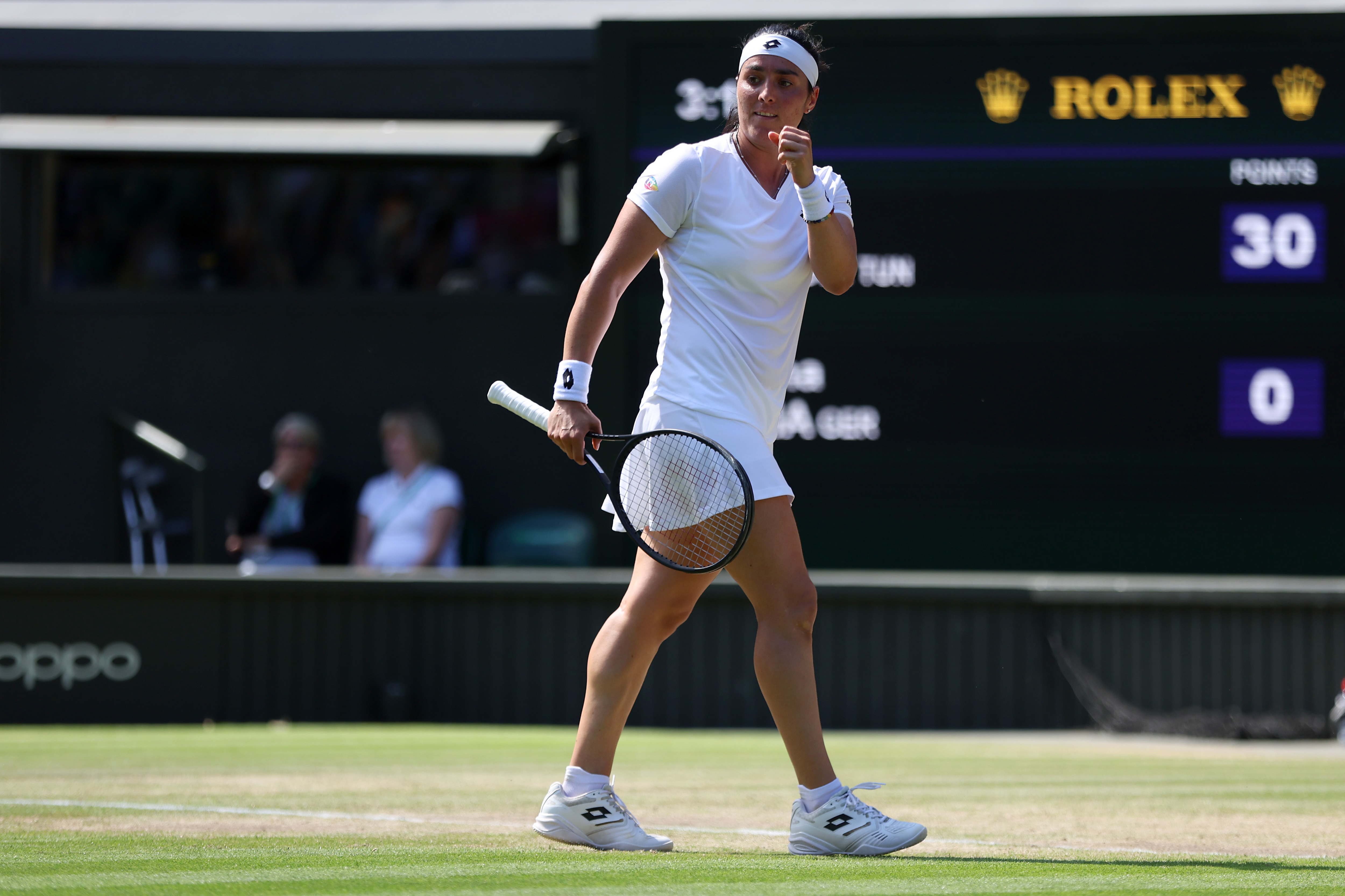 LONDON, ENGLAND - JULY 07: Ons Jabeur of Tunisia celebrates a point against Tatjana Maria of Germany during their Women's Singles Semi-Final match on day eleven of The Championships Wimbledon 2022 at All England Lawn Tennis and Croquet Club on July 07, 2022 in London, England. (Photo by Clive Brunskill/Getty Images)
