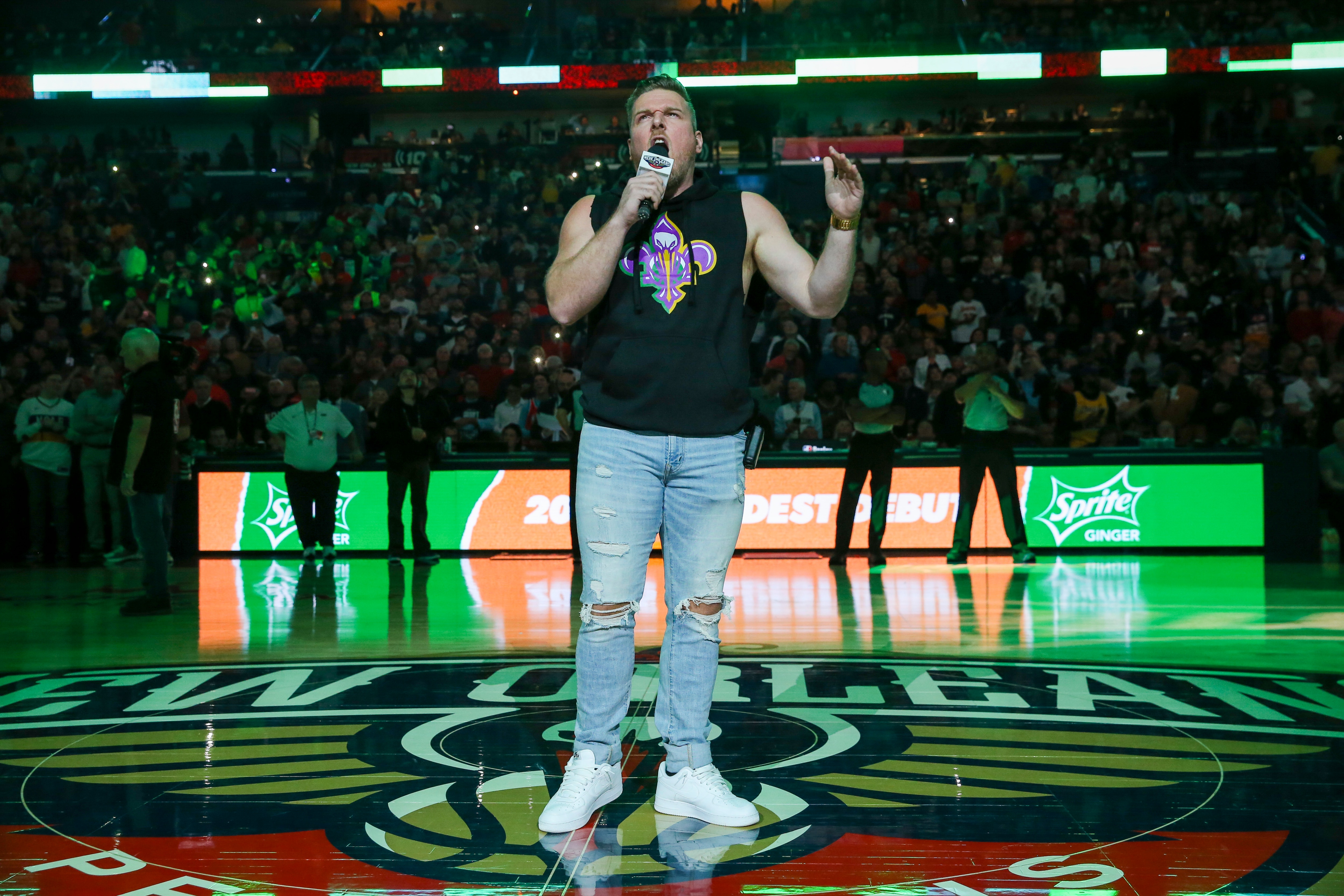 NEW ORLEANS, LA - MARCH 3: Retired NFL Punter Pat McAfee announces the players before the game between the Minnesota Timberwolves and the New Orleans Pelicans on March 3, 2020 at the Smoothie King Center in New Orleans, Louisiana. NOTE TO USER: User expressly acknowledges and agrees that, by downloading and or using this Photograph, user is consenting to the terms and conditions of the Getty Images License Agreement. Mandatory Copyright Notice: Copyright 2020 NBAE (Photo by Layne Murdoch Jr./NBAE via Getty Images)