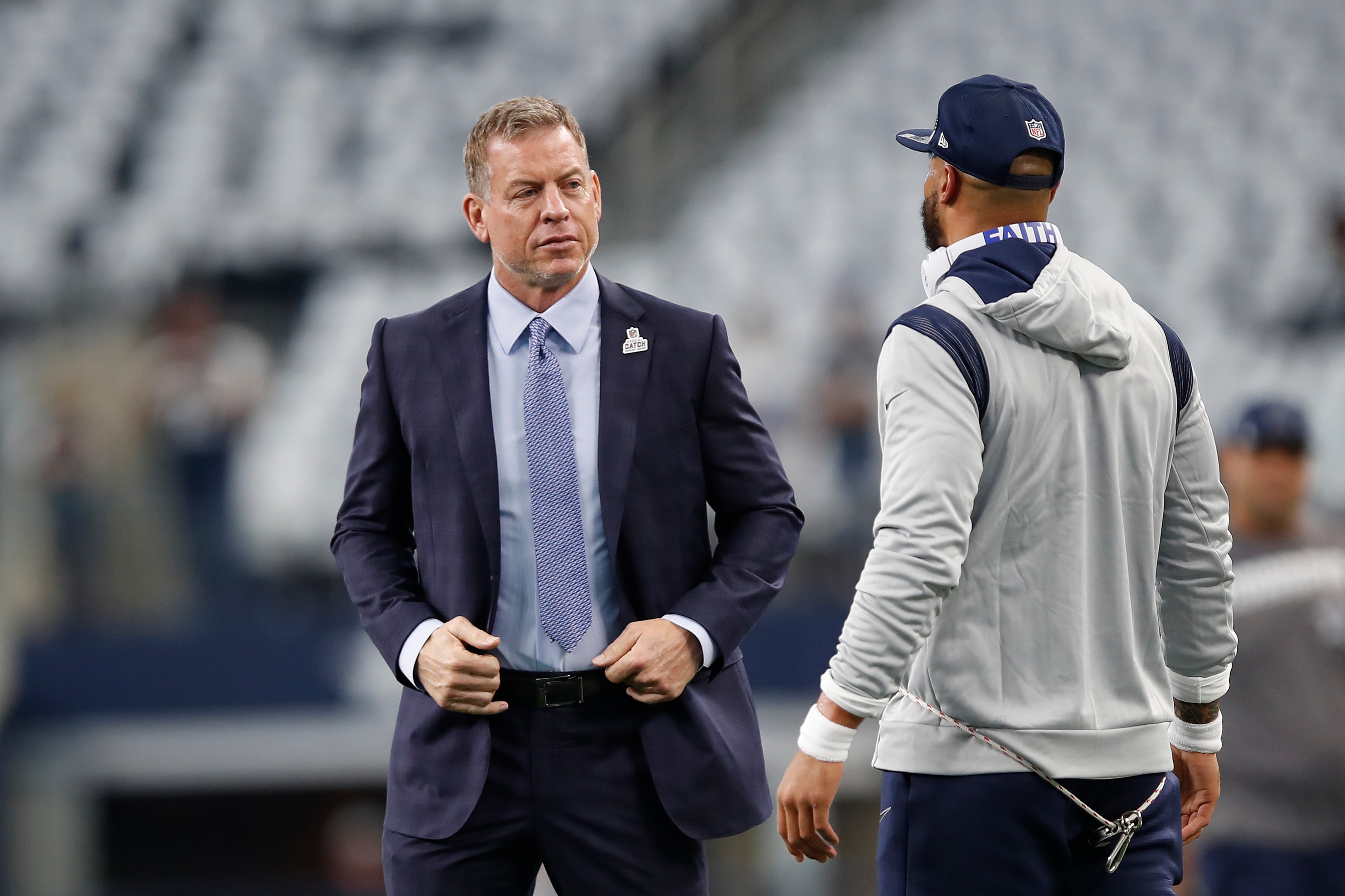 ARLINGTON, TEXAS - OCTOBER 10: (L-R) Tory Aikman talks with Dak Prescott #4 of the Dallas Cowboys before the game against the New York Giants at AT&T Stadium on October 10, 2021 in Arlington, Texas. (Photo by Wesley Hitt/Getty Images)