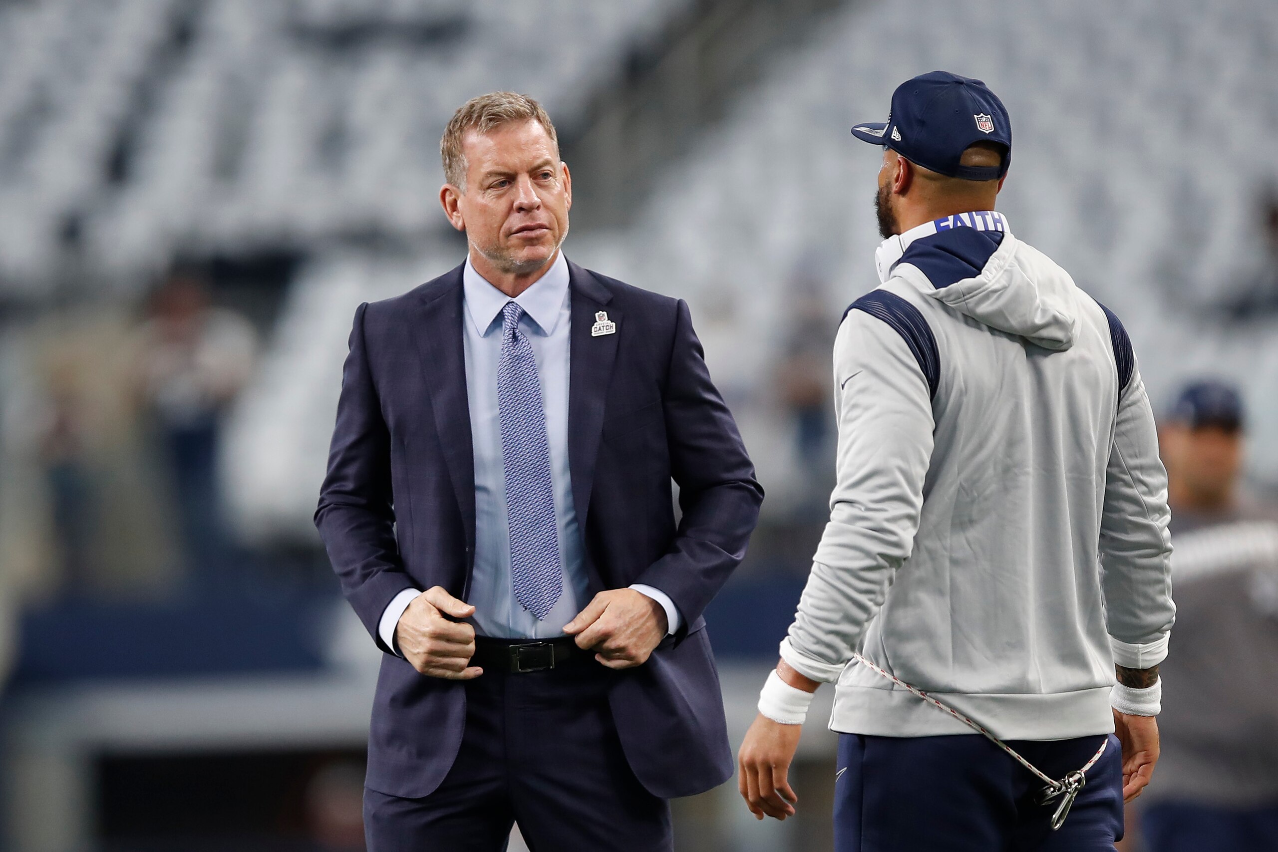 ARLINGTON, TEXAS - OCTOBER 10: (L-R) Tory Aikman talks with Dak Prescott #4 of the Dallas Cowboys before the game against the New York Giants at AT&T Stadium on October 10, 2021 in Arlington, Texas. (Photo by Wesley Hitt/Getty Images)