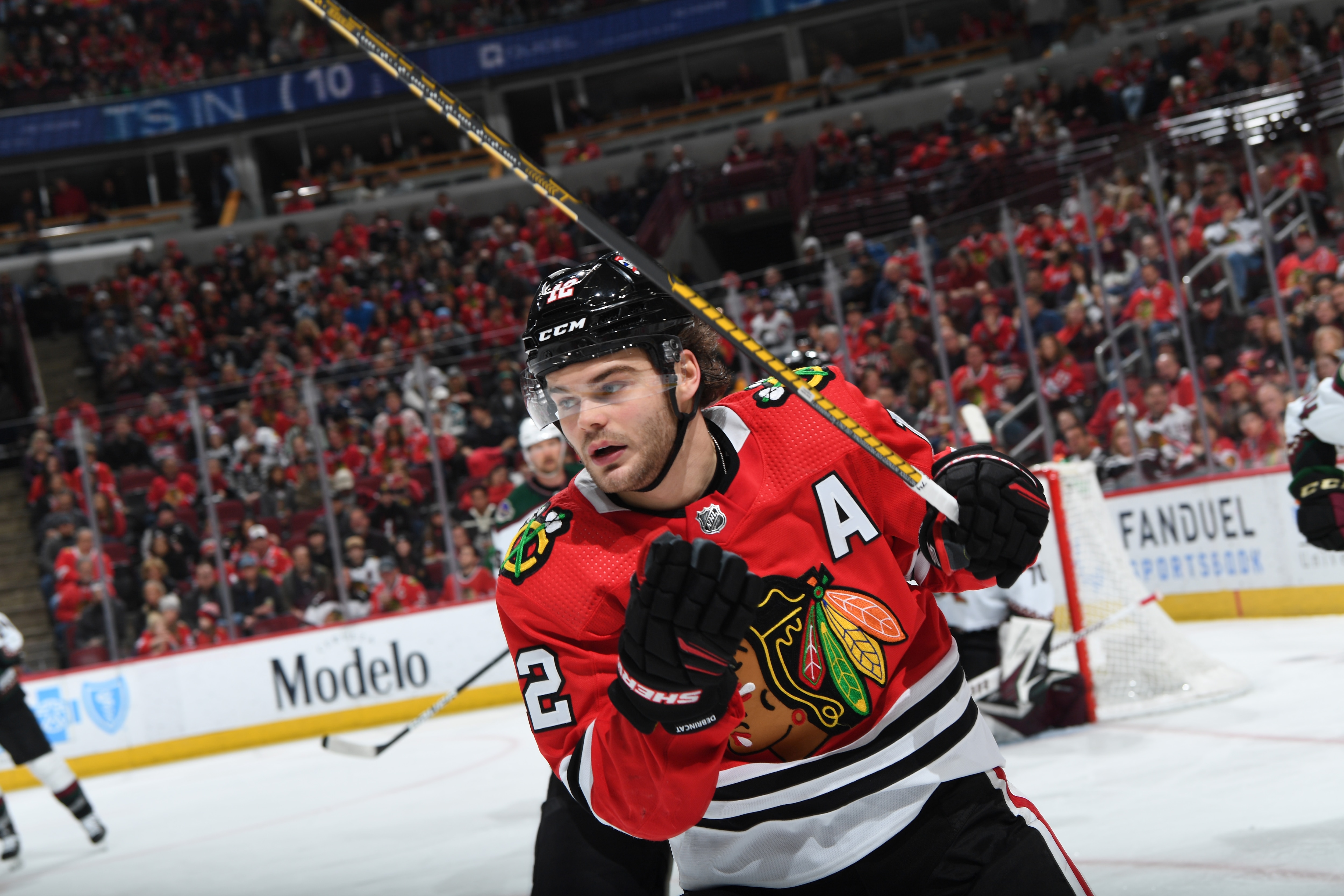 CHICAGO, ILLINOIS - APRIL 03: Alex DeBrincat #12 of the Chicago Blackhawks skates in the third period against the Arizona Coyotes at United Center on April 03, 2022 in Chicago, Illinois. (Photo by Bill Smith/NHLI via Getty Images)