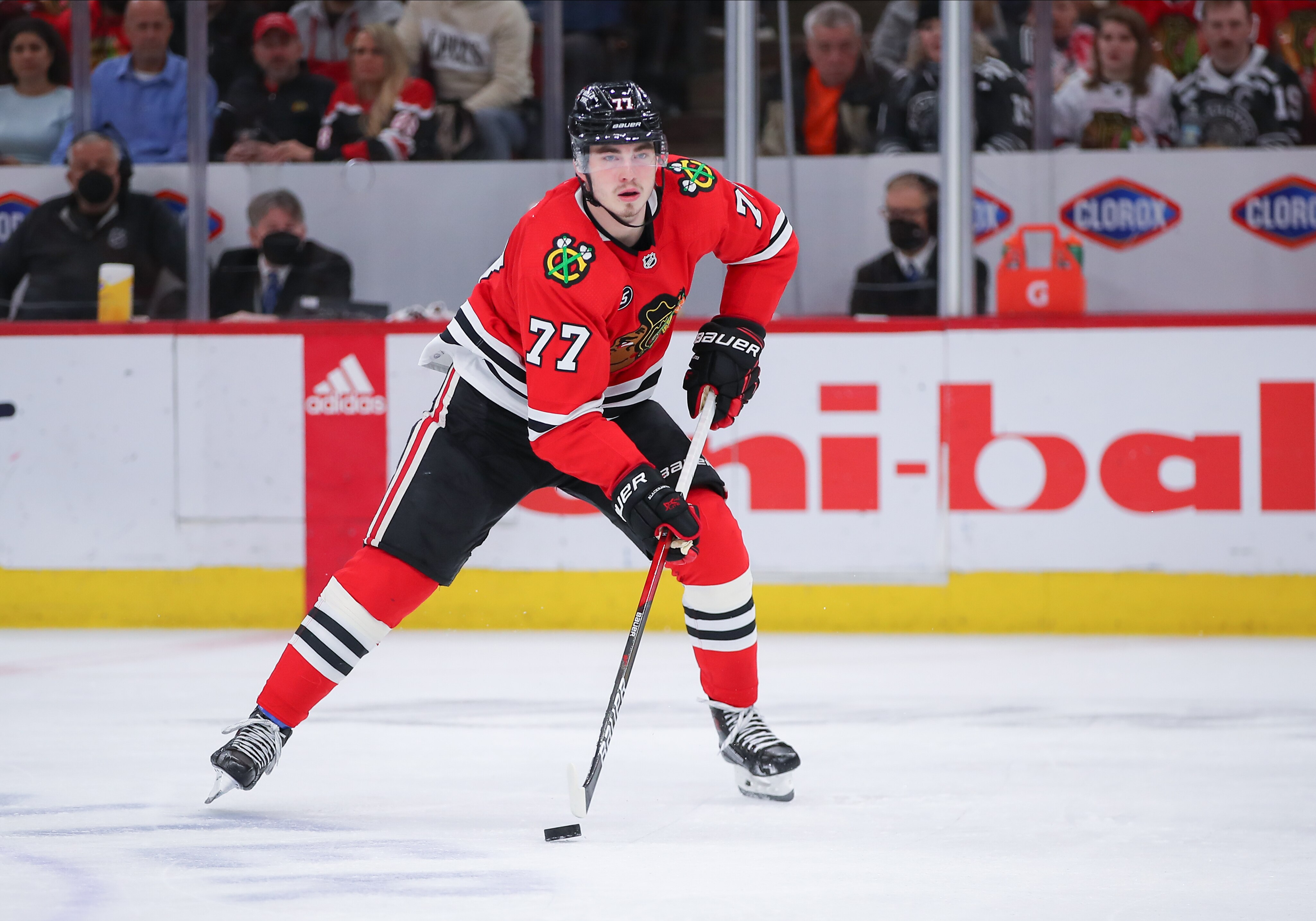 CHICAGO, IL - APRIL 10: Chicago Blackhawks center Kirby Dach (77) skates with the puck in action during a game between the Dallas Stars and the Chicago Blackhawks on April 10, 2022 at the United Center in Chicago, IL. (Photo by Melissa Tamez/Icon Sportswire via Getty Images)