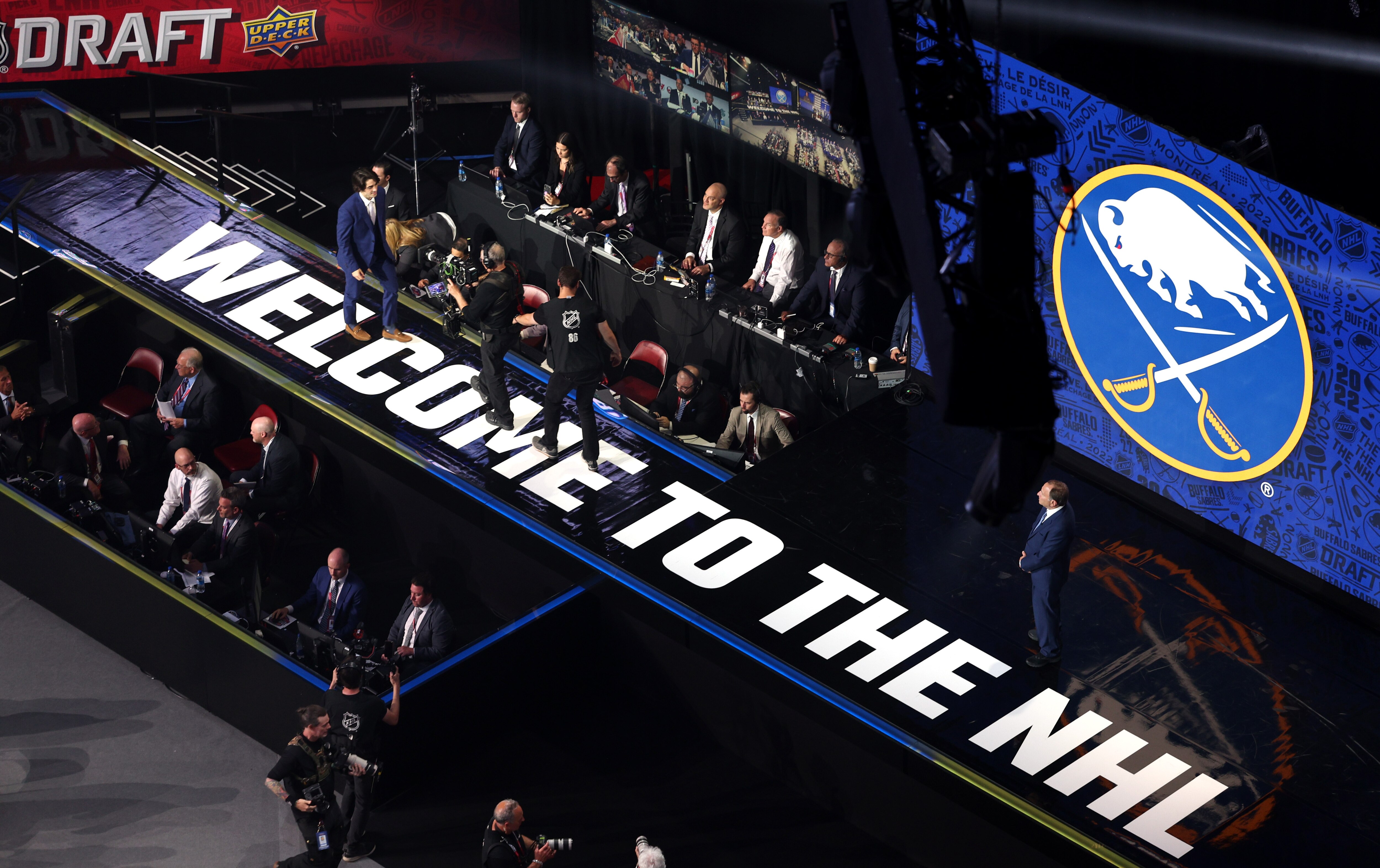MONTREAL, QUEBEC - JULY 07: Matthew Savoie walks toward the stage after being selected ninth overall by the Buffalo Sabres during the first round of the 2022 Upper Deck NHL Draft at Bell Centre on July 07, 2022 in Montreal, Quebec. (Photo by Vitor Munhoz/NHLI via Getty Images)