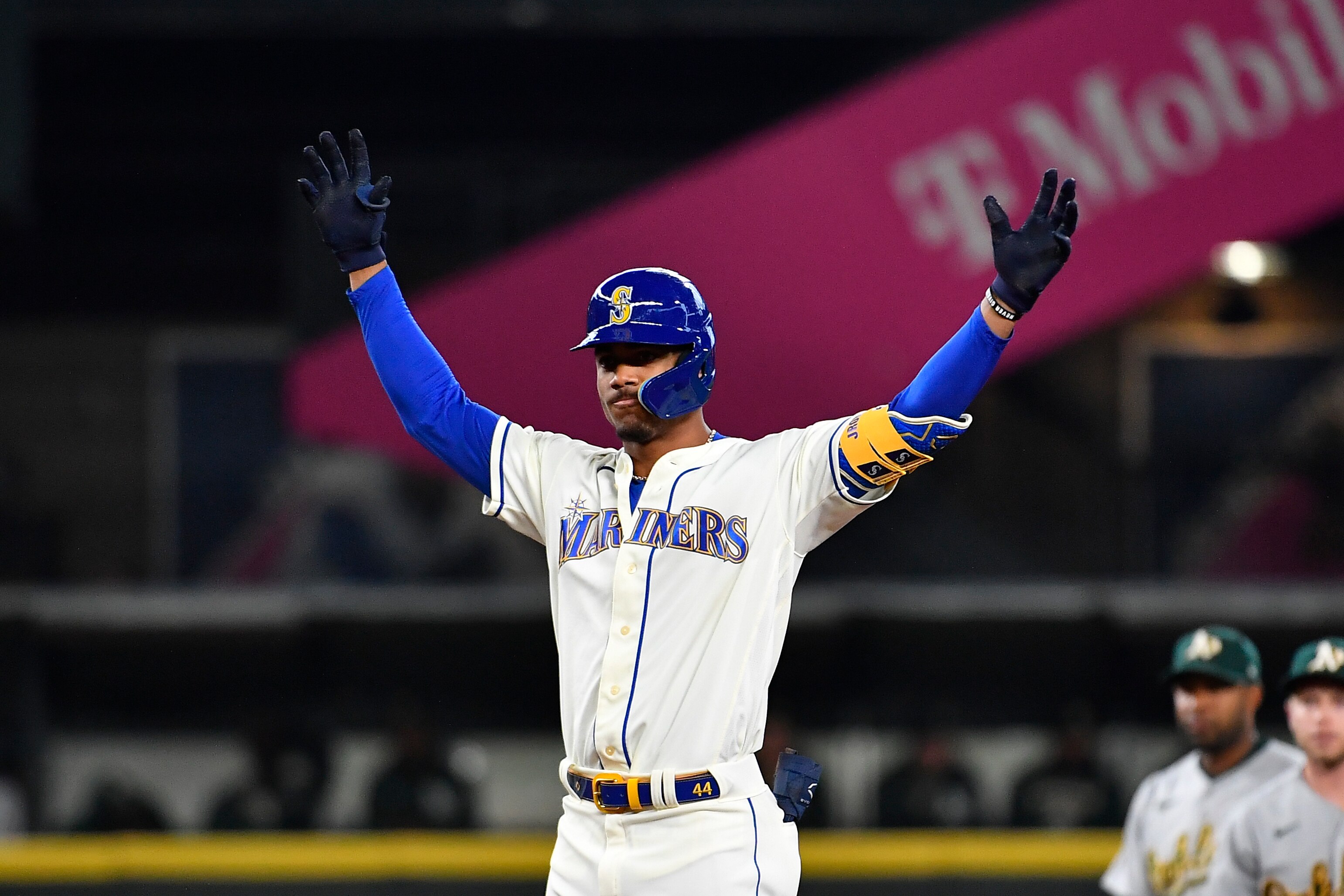 SEATTLE, WASHINGTON - JULY 03: Julio Rodriguez #44 of the Seattle Mariners gestures after hitting an RBI double during the sixth inning against the Oakland Athletics at T-Mobile Park on July 03, 2022 in Seattle, Washington. (Photo by Alika Jenner/Getty Images)