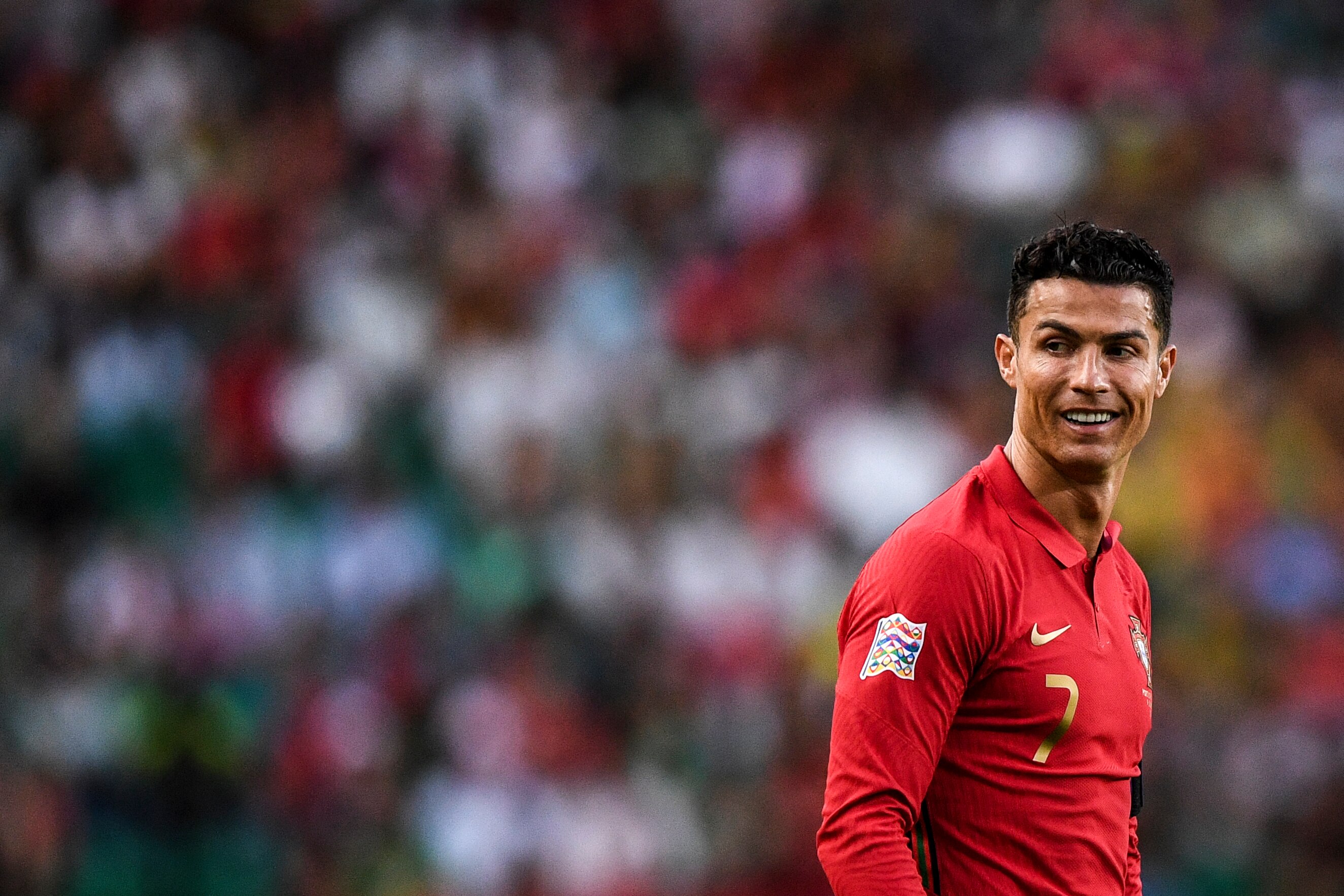 Portugal's forward Cristiano Ronaldo smiles during the UEFA Nations League, league A group 2 football match between Portugal and Czech Republic at the Jose Alvalade stadium in Lisbon on June 9, 2022. (Photo by PATRICIA DE MELO MOREIRA / AFP) (Photo by PATRICIA DE MELO MOREIRA/AFP via Getty Images)