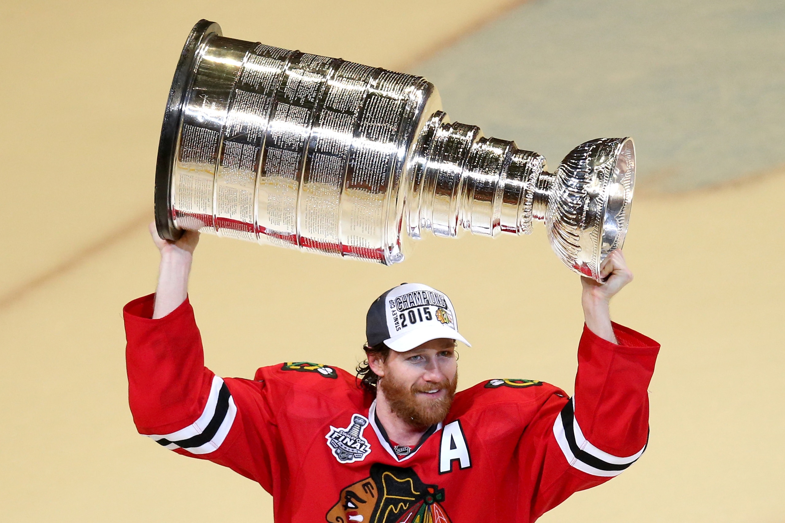CHICAGO, IL - JUNE 15:  Duncan Keith #2 of the Chicago Blackhawks celebrates with the Stanley Cup after defeating the Tampa Bay Lightning  by a score of 2-0 in Game Six to win the 2015 NHL Stanley Cup Final at the United Center  on June 15, 2015 in Chicago, Illinois.  (Photo by Jonathan Daniel/Getty Images)