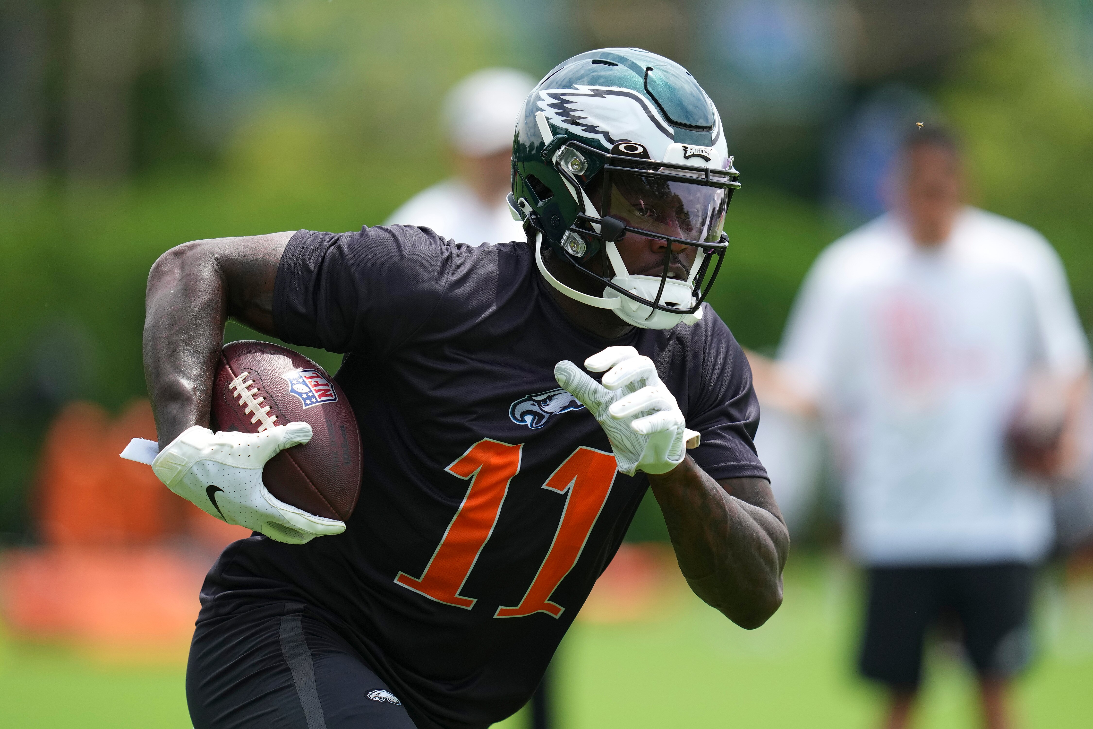 PHILADELPHIA, PA - JUNE 03: A.J. Brown #11 of the Philadelphia Eagles runs with the ball during OTAs at the NovaCare Complex on June 3, 2022 in Philadelphia, Pennsylvania. (Photo by Mitchell Leff/Getty Images)