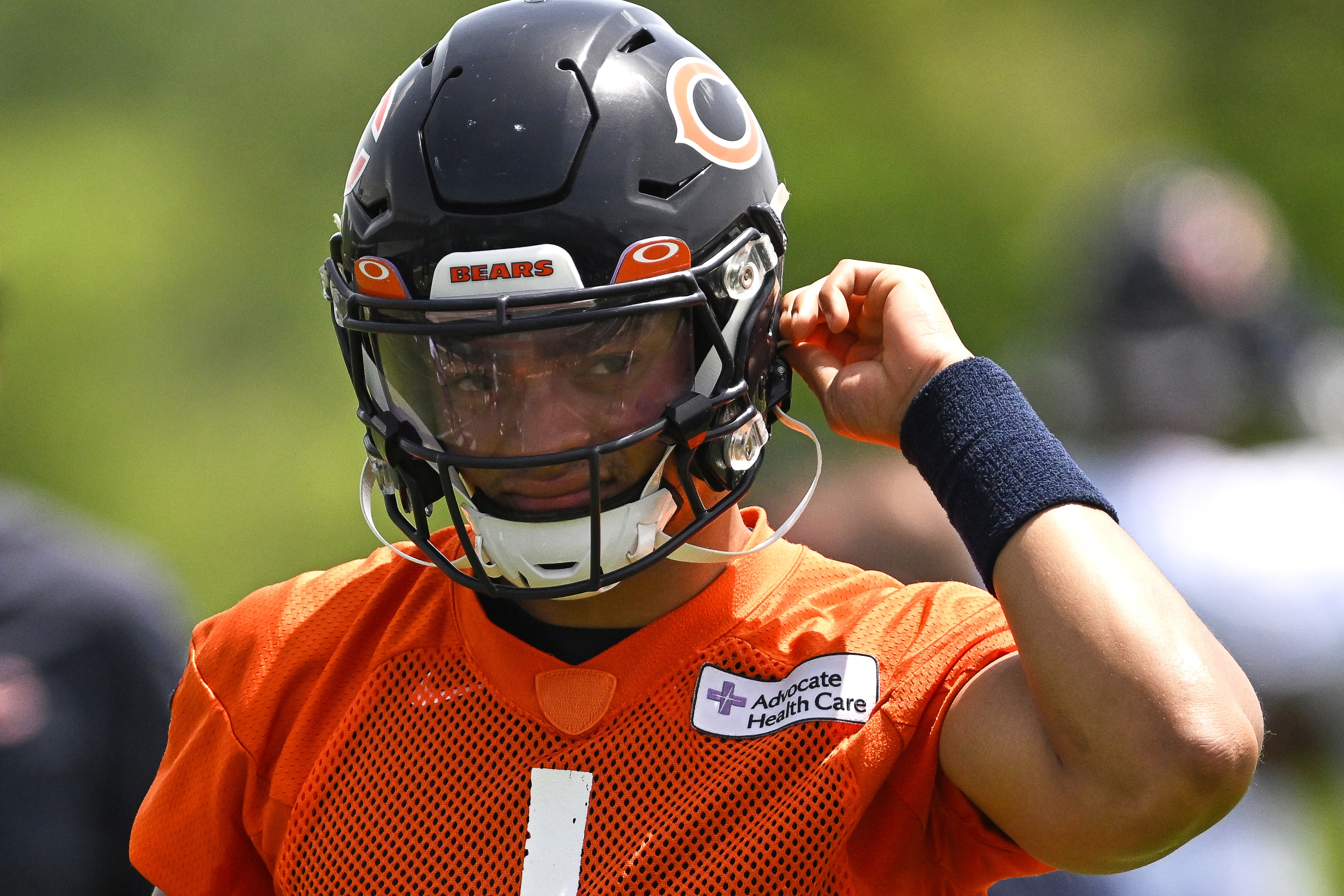 LAKE FOREST, IL - JUNE 15: Chicago Bears quarterback Justin Fields (1) adjusts his helmet during the the Chicago Bears Minicamp on June 15, 2022 at Halas Hall in Lake Forest, IL. (Photo by Robin Alam/Icon Sportswire via Getty Images)