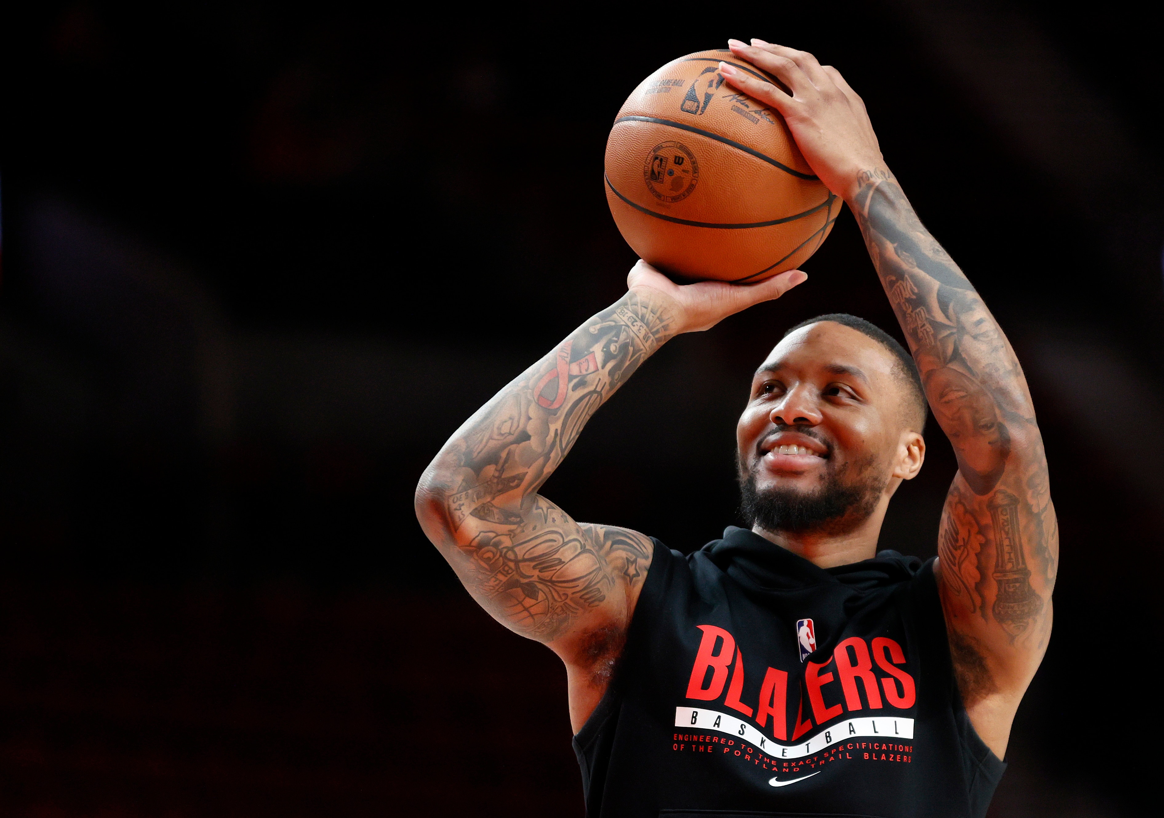 PORTLAND, OREGON - FEBRUARY 08: Damian Lillard #0 of the Portland Trail Blazers warms up before the game against the Orlando Magic at Moda Center on February 08, 2022 in Portland, Oregon. NOTE TO USER: User expressly acknowledges and agrees that, by downloading and/or using this photograph, User is consenting to the terms and conditions of the Getty Images License Agreement. (Photo by Steph Chambers/Getty Images) (Photo by Steph Chambers/Getty Images)