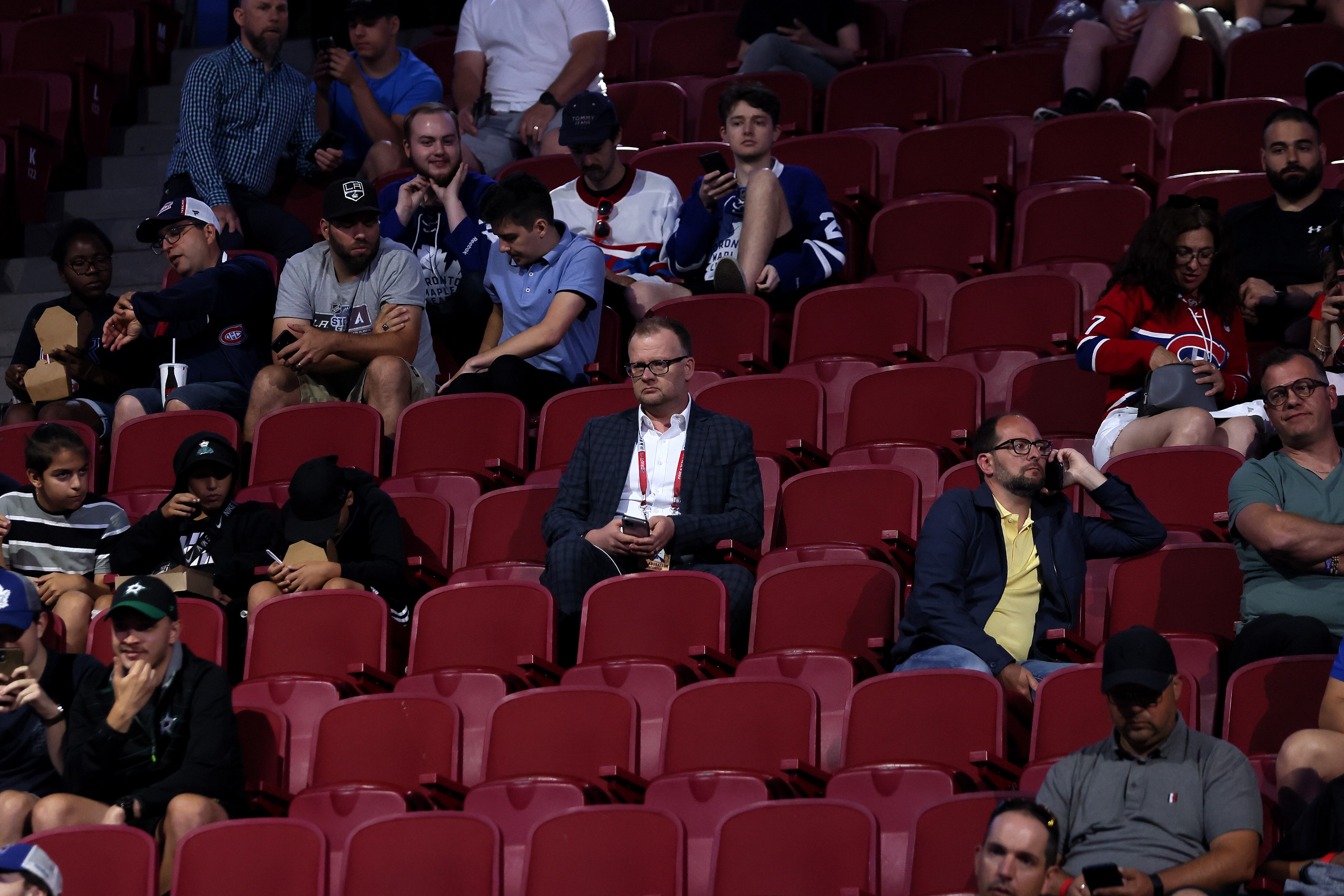 MONTREAL, QUEBEC - JULY 08: General Manager Brad Treliving of the Calgary Flames sits in the crowd during Round Six of the 2022 Upper Deck NHL Draft at Bell Centre on July 08, 2022 in Montreal, Quebec, Canada. (Photo by Bruce Bennett/Getty Images)