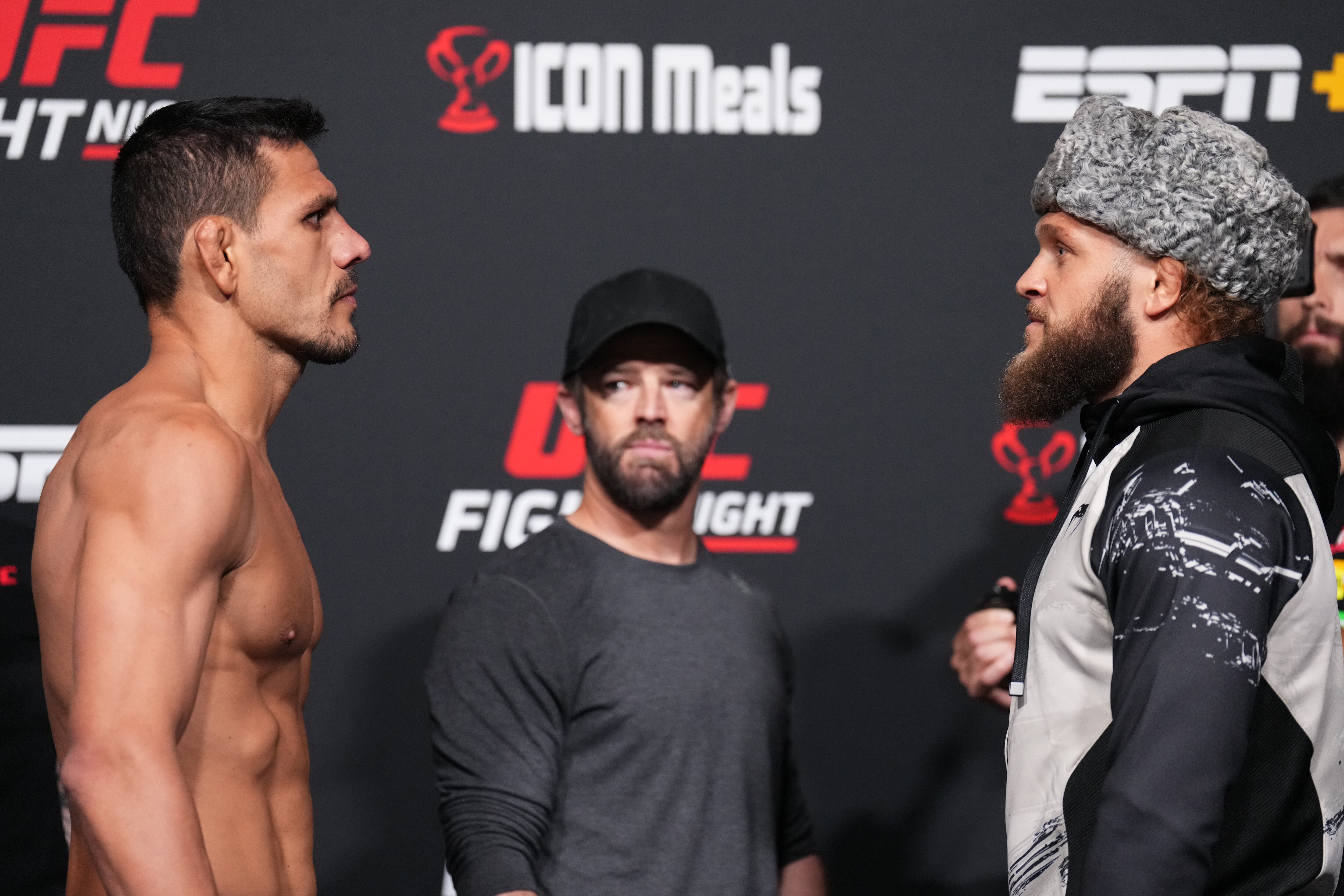 LAS VEGAS, NEVADA - JULY 08:  (L-R) Rafael Dos Anjos of Brazil and Rafael Fiziev of Kazakstan face off during the UFC Fight Night weigh-in at UFC APEX on July 08, 2022 in Las Vegas, Nevada. (Photo by Chris Unger/Zuffa LLC)