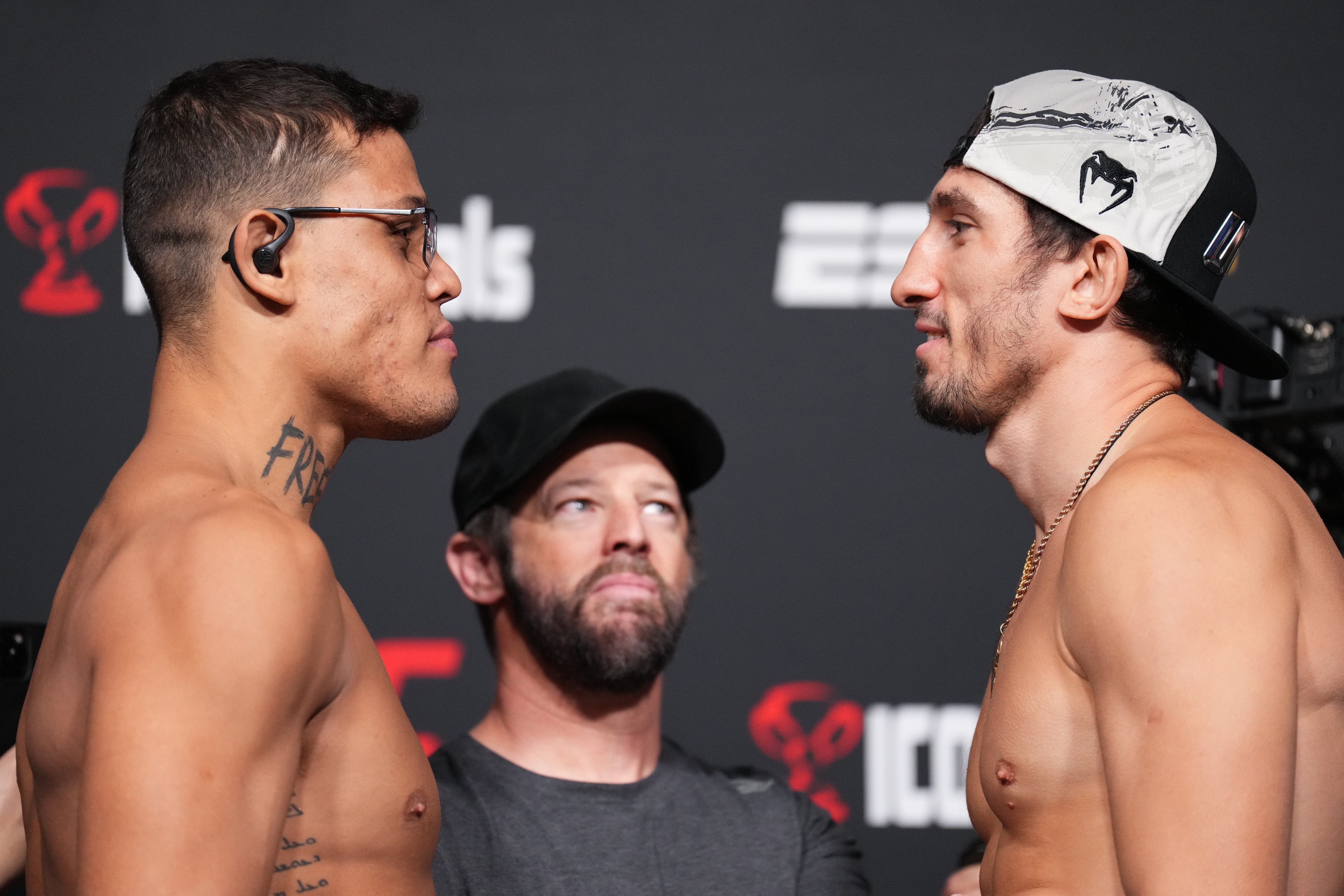 LAS VEGAS, NEVADA - JULY 08: (L-R) Opponents Caio Borralho of Brazil and Armen Petrosyan of Russia face off during the UFC Fight Night weigh-in at UFC APEX on July 08, 2022 in Las Vegas, Nevada. (Photo by Chris Unger/Zuffa LLC)