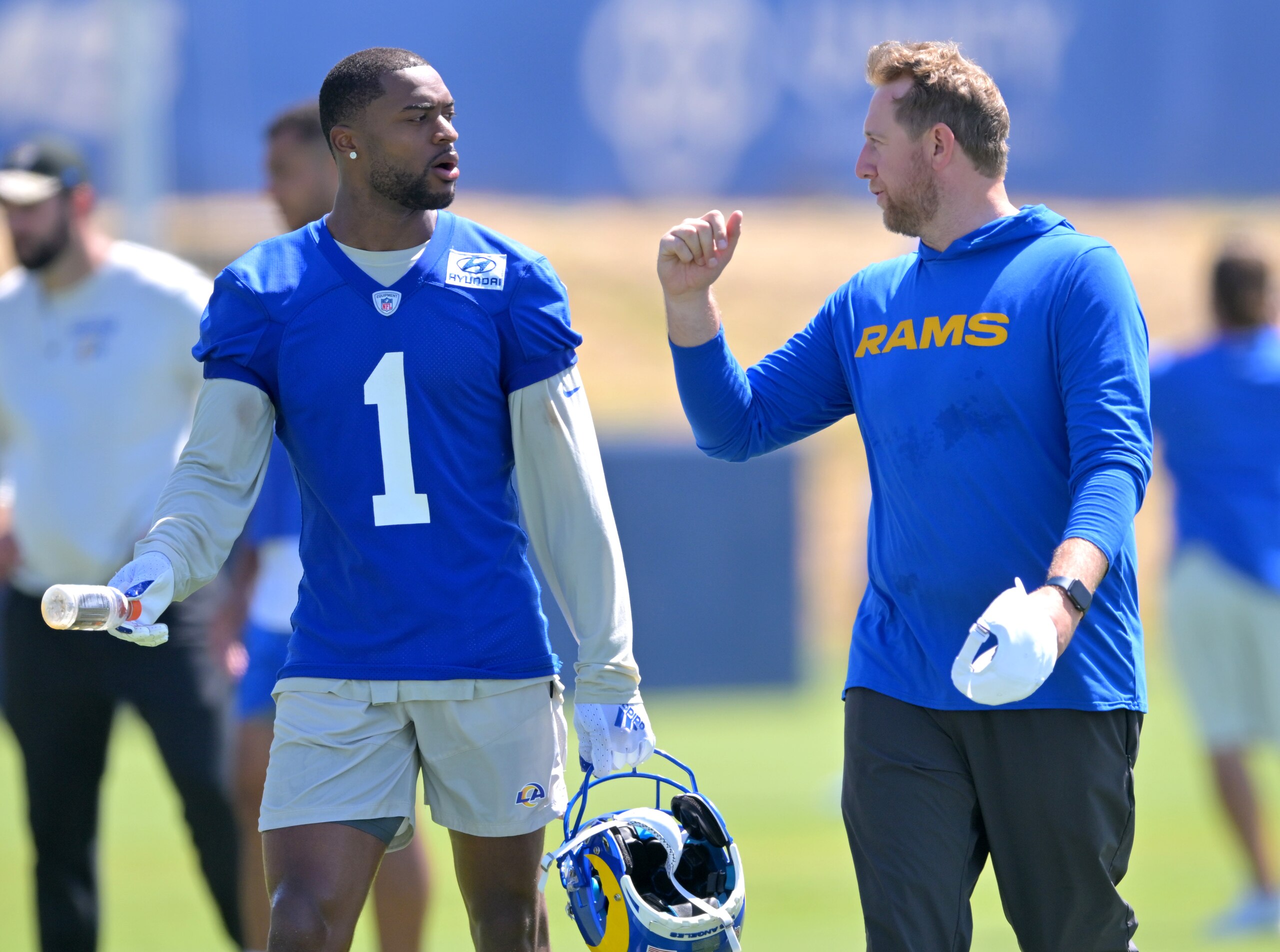 THOUSAND OAKS, CA - JUNE 7 : Allen Robinson II #1 of the Los Angeles Rams talks with offensive coordinator Liam Coen during mini camp on June 7, 2022 at the team's facility at California Lutheran University in Thousand Oaks, California. (Photo by Jayne Kamin-Oncea/Getty Images) THOUSAND OAKS, CA - JUNE 7 : Allen Robinson II #1 of the Los Angeles Rams talks with offensive coordinator Liam Coen during mini camp on June 7, 2022 at the team's facility at California Lutheran University in Thousand Oaks, California. (Photo by Jayne Kamin-Oncea/Getty Images)
