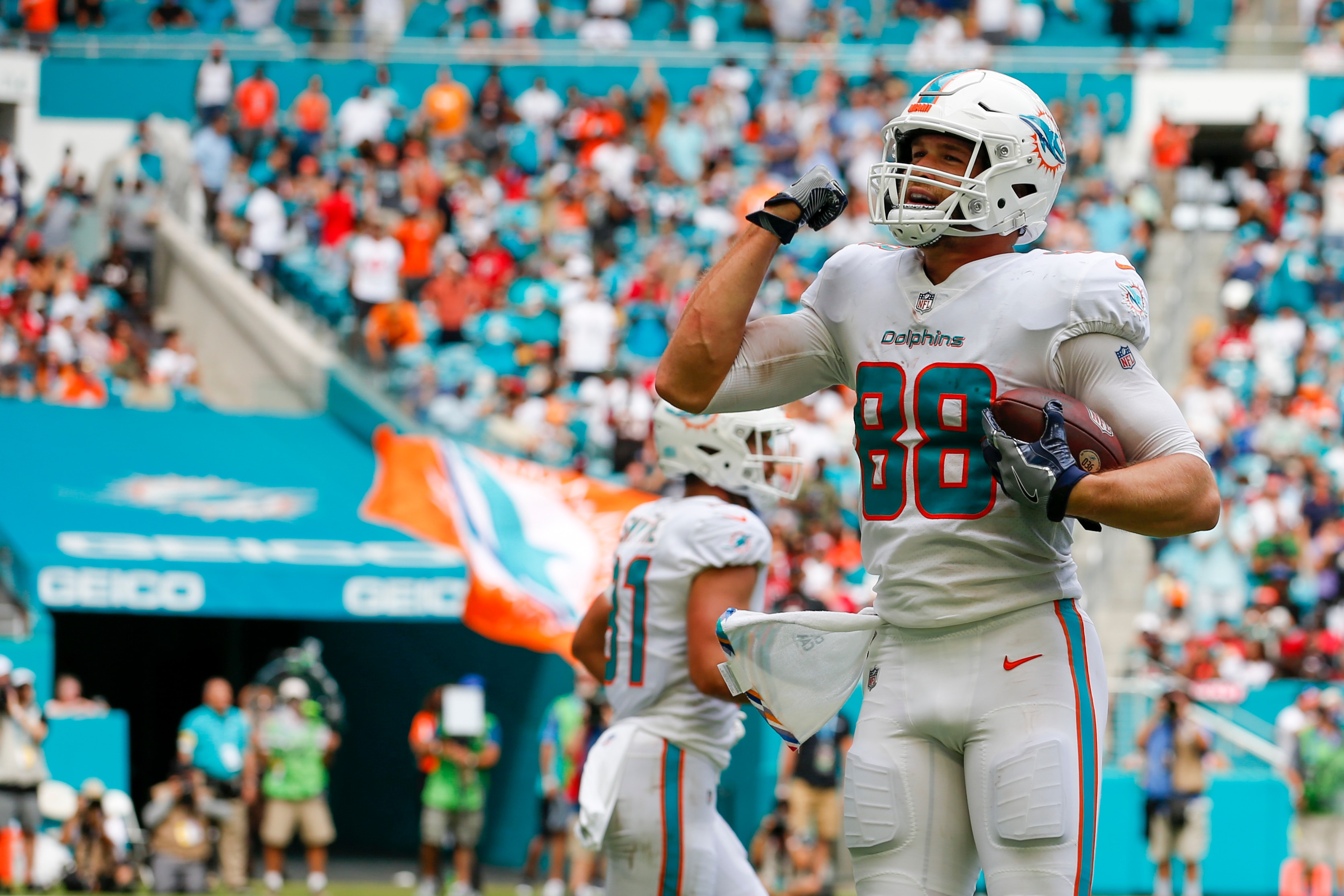 MIAMI GARDENS, FL - OCTOBER 24: Miami Dolphins tight end Mike Gesicki (88) celebrates a touchdown during the game between the Atlanta Falcons and the Miami Dolphins on October 24, 2021 at Hard Rock Stadium in Miami Gardens, Fl. (Photo by David Rosenblum/Icon Sportswire via Getty Images)
