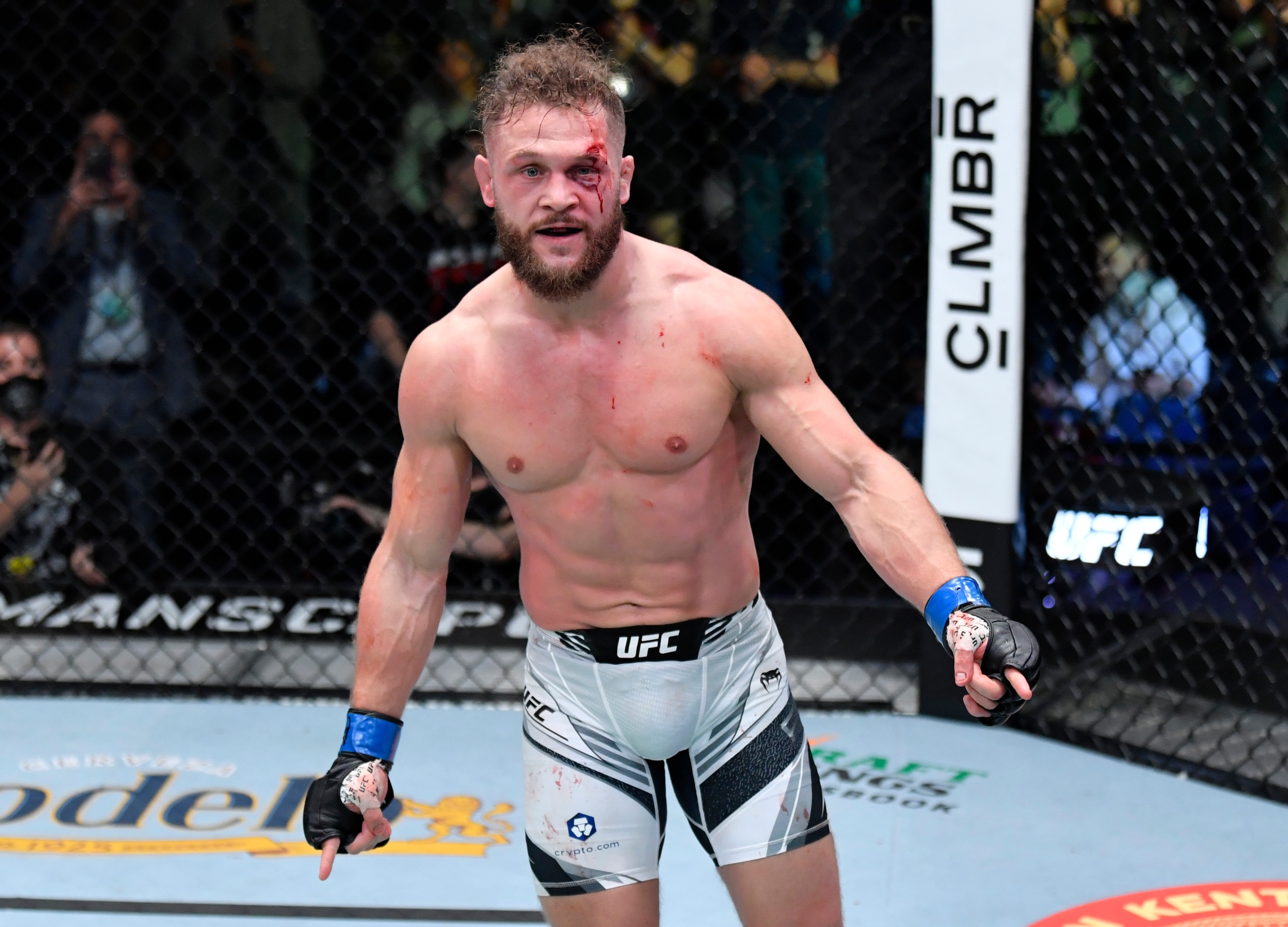 LAS VEGAS, NEVADA - DECEMBER 04: Rafael Fiziev of Kyrgyzstan reacts after his knockout victory over Brad Riddell of New Zealand in their lightweight fight during the UFC Fight Night event at UFC APEX on December 04, 2021 in Las Vegas, Nevada. (Photo by Jeff Bottari/Zuffa LLC)