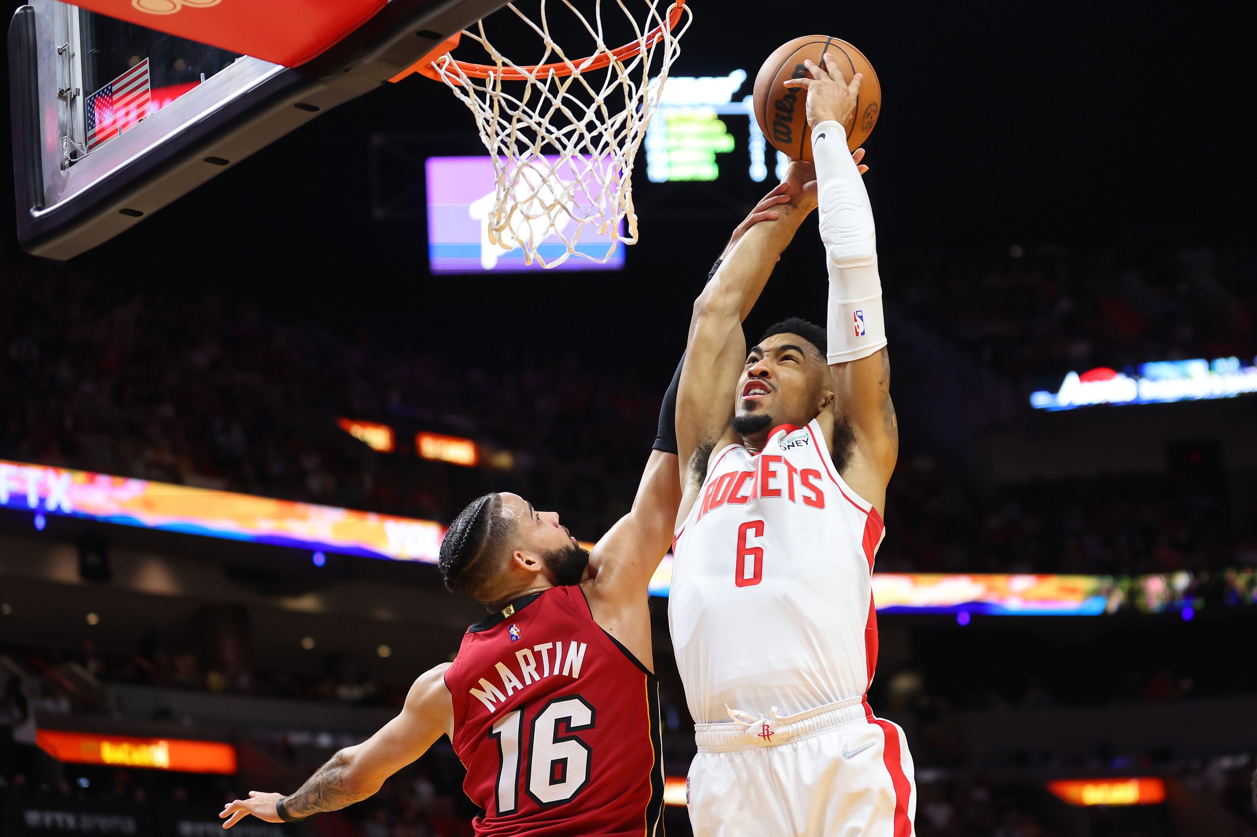 MIAMI, FLORIDA - MARCH 07: Kenyon Martin Jr. #6 of the Houston Rockets dunks against Caleb Martin #16 of the Miami Heat during the first half at FTX Arena on March 07, 2022 in Miami, Florida. NOTE TO USER: User expressly acknowledges and agrees that, by downloading and or using this photograph, User is consenting to the terms and conditions of the Getty Images License Agreement. (Photo by Michael Reaves/Getty Images) MIAMI, FLORIDA - MARCH 07: Kenyon Martin Jr. #6 of the Houston Rockets dunks against Caleb Martin #16 of the Miami Heat during the first half at FTX Arena on March 07, 2022 in Miami, Florida. NOTE TO USER: User expressly acknowledges and agrees that, by downloading and or using this photograph, User is consenting to the terms and conditions of the Getty Images License Agreement. (Photo by Michael Reaves/Getty Images)