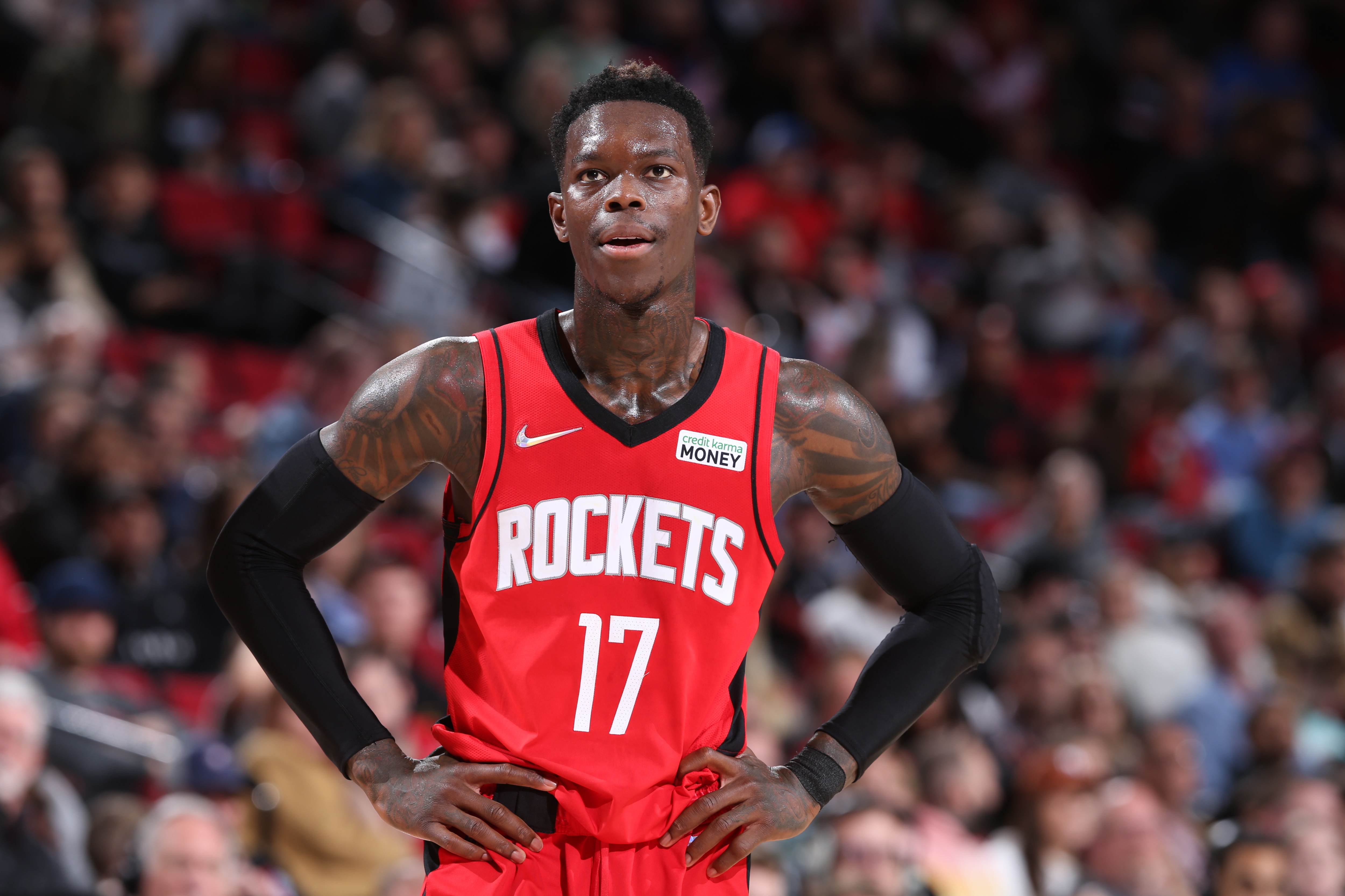 PORTLAND, OR - MARCH 26: Dennis Schroder #17 of the Houston Rockets looks on during the game against the Portland Trail Blazers on March 26, 2022 at the Moda Center Arena in Portland, Oregon. NOTE TO USER: User expressly acknowledges and agrees that, by downloading and or using this photograph, user is consenting to the terms and conditions of the Getty Images License Agreement. Mandatory Copyright Notice: Copyright 2022 NBAE (Photo by Sam Forencich/NBAE via Getty Images)