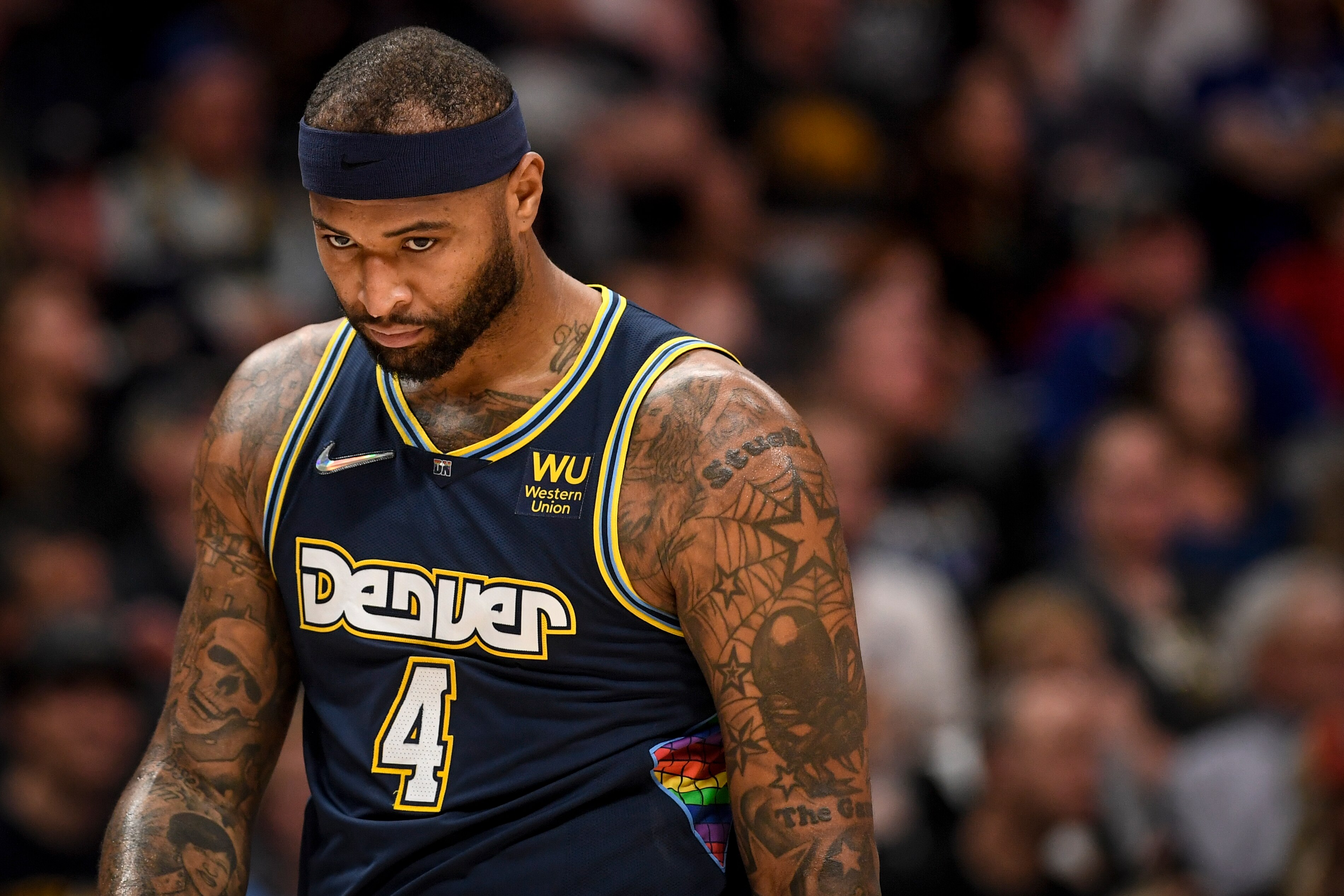 DENVER, CO - APRIL 24: DeMarcus Cousins (4) of the Denver Nuggets reacts to being called for fouling Andrew Wiggins (22) of the Golden State Warriors during the second quarter at Ball Arena on Sunday, April 24, 2022. (Photo by AAron Ontiveroz/MediaNews Group/The Denver Post via Getty Images)