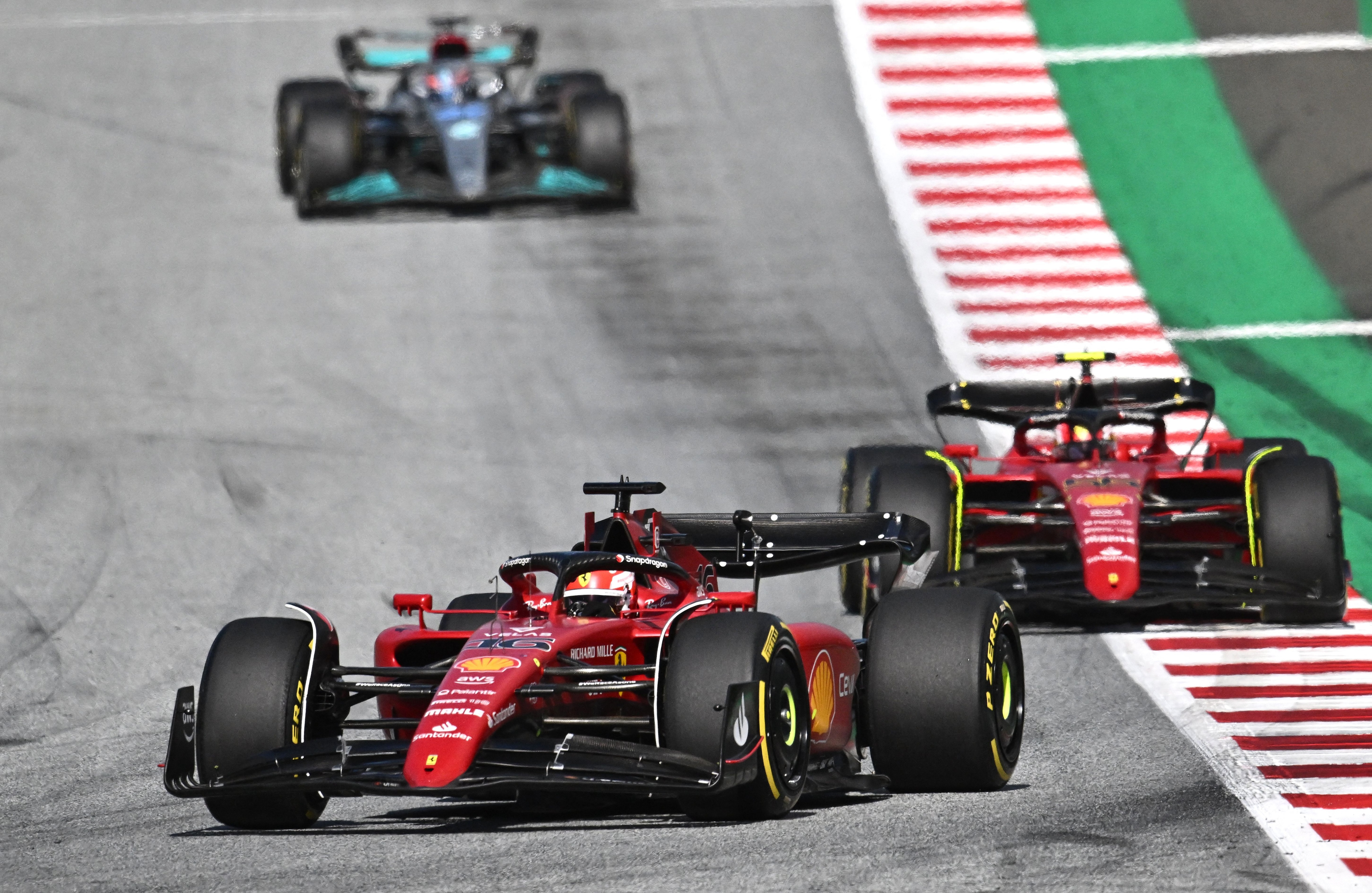 Ferrari's Monegasque driver Charles Leclerc (L) and Ferrari's Spanish driver Carlos Sainz Jr (R) compete during the sprint qualifying at the Red Bull Ring race track in Spielberg, Austria, on July 9, 2022, ahead of the Formula One Austrian Grand Prix. (Photo by JOE KLAMAR / AFP) (Photo by JOE KLAMAR/AFP via Getty Images) Ferrari's Monegasque driver Charles Leclerc (L) and Ferrari's Spanish driver Carlos Sainz Jr (R) compete during the sprint qualifying at the Red Bull Ring race track in Spielberg, Austria, on July 9, 2022, ahead of the Formula One Austrian Grand Prix. (Photo by JOE KLAMAR / AFP) (Photo by JOE KLAMAR/AFP via Getty Images)