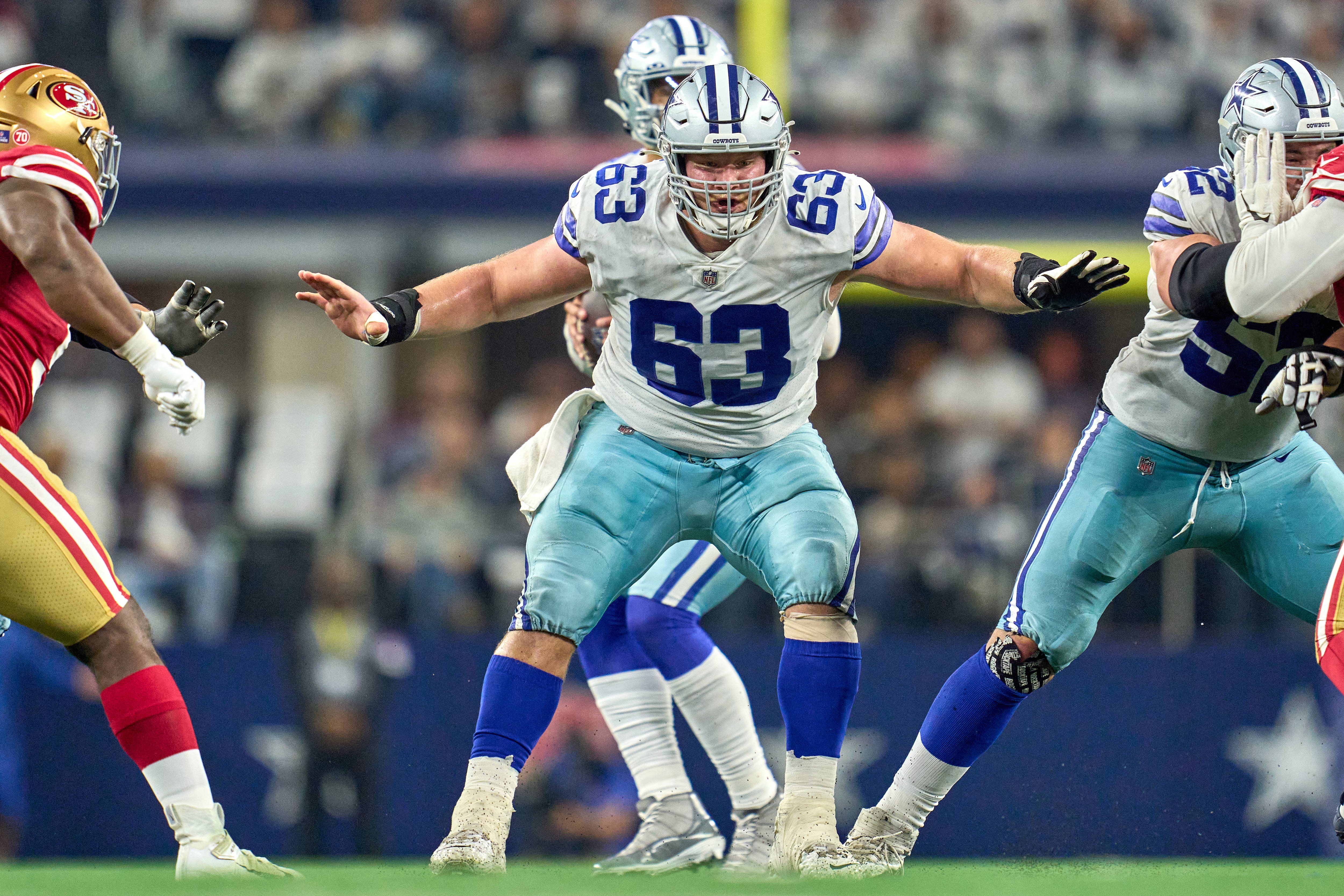 ARLINGTON, TX - JANUARY 16: Dallas Cowboys center Tyler Biadasz (63) battles in action during the NFC Wild Card game between the San Francisco 49ers and the Dallas Cowboys on January 16, 2022 at AT&T Stadium in Arlington, TX. (Photo by Robin Alam/Icon Sportswire via Getty Images)