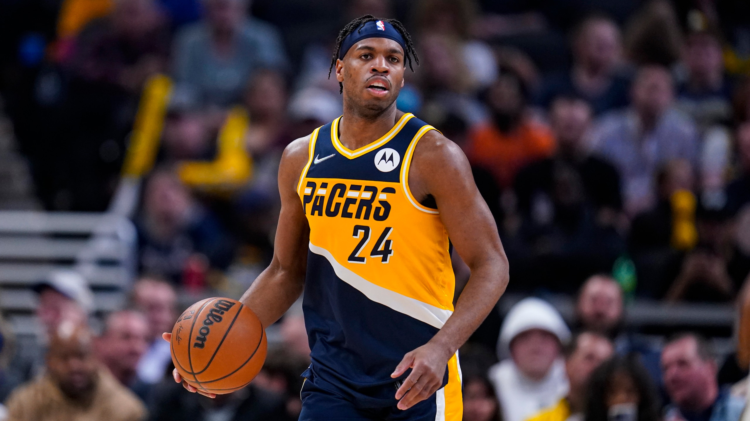 Indiana Pacers guard Buddy Hield (24) plays against the Detroit Pistons during the second half of an NBA basketball game in Indianapolis, Sunday, April 3, 2022. The Pistons defeated the Pacers 121-117(AP Photo/Michael Conroy)
