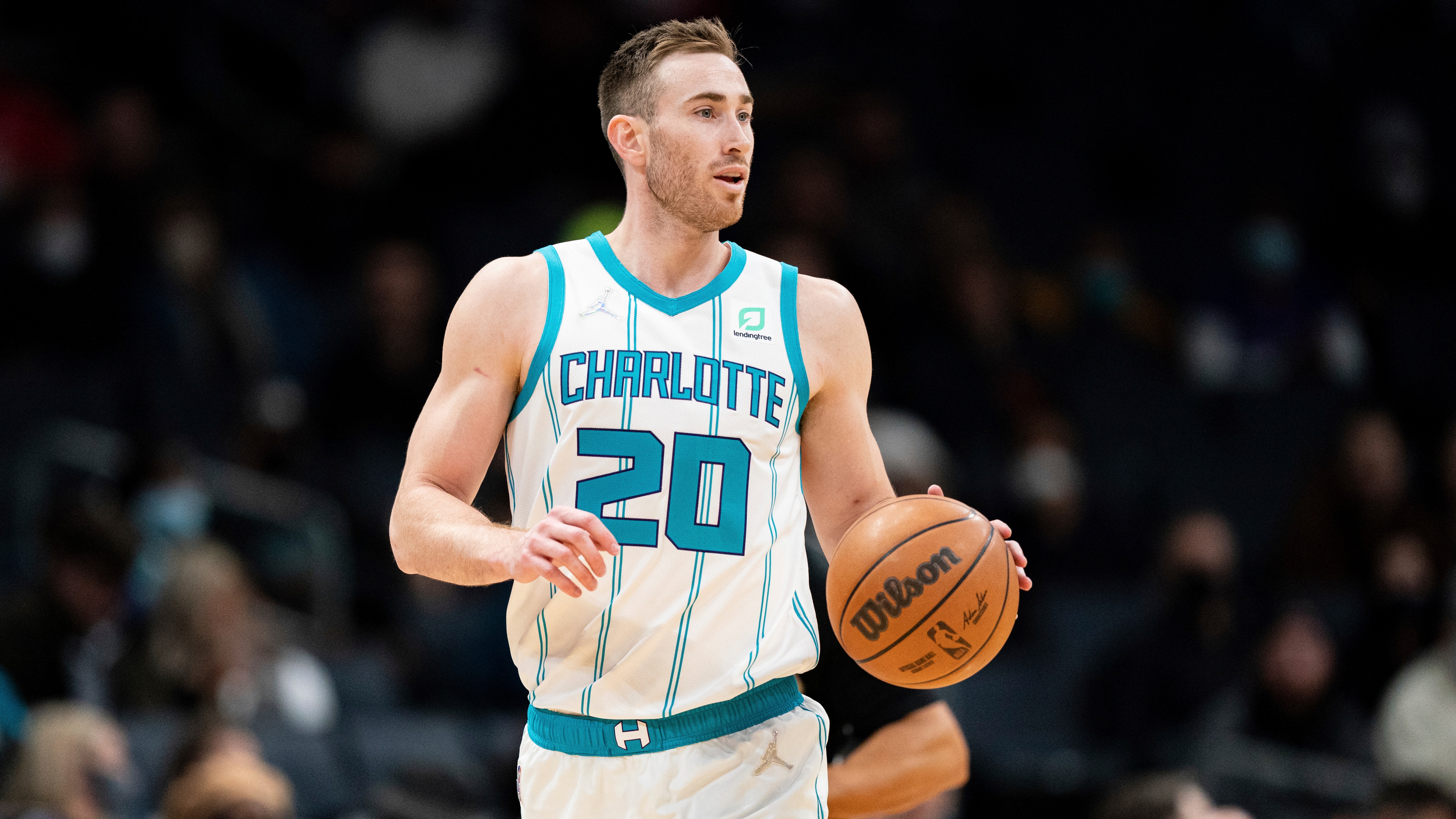 Charlotte Hornets forward Gordon Hayward (20) brings the ball up court against the Toronto Raptors during the first half of an NBA basketball game in Charlotte, N.C., Monday, Feb. 7, 2022. (AP Photo/Jacob Kupferman)