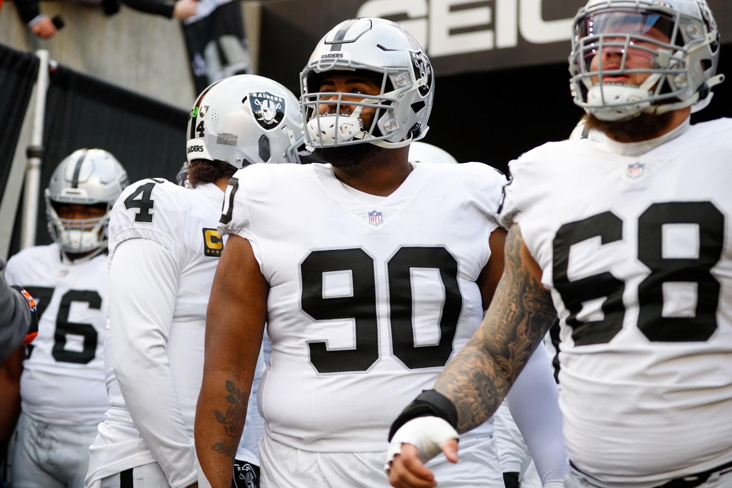 CINCINNATI, OH - JANUARY 15: Las Vegas Raiders defensive tackle Johnathan Hankins (90) looks at the scoreboard before the Wild Card game against the Las Vegas Raiders and the Cincinnati Bengals on January 15, 2022, at Paul Brown Stadium in Cincinnati, OH. (Photo by Ian Johnson/Icon Sportswire via Getty Images) CINCINNATI, OH - JANUARY 15: Las Vegas Raiders defensive tackle Johnathan Hankins (90) looks at the scoreboard before the Wild Card game against the Las Vegas Raiders and the Cincinnati Bengals on January 15, 2022, at Paul Brown Stadium in Cincinnati, OH. (Photo by Ian Johnson/Icon Sportswire via Getty Images)