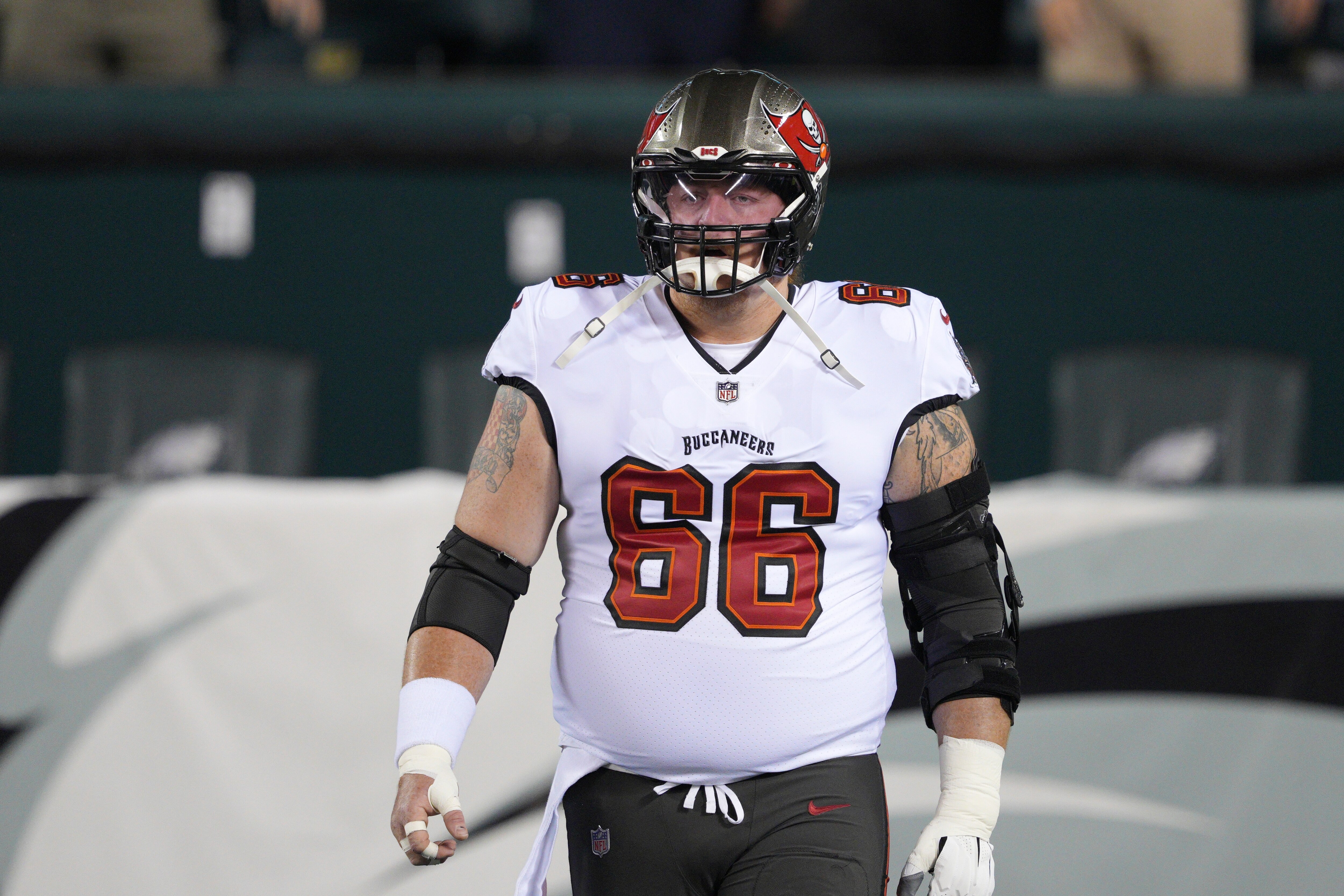 PHILADELPHIA, PA - OCTOBER 14: Tampa Bay Buccaneers Center Ryan Jensen (66) looks on during the game between the Philadelphia Eagles and the Tampa Bay Buccaneers on October 14, 2021 at Lincoln Financial Field in Philadelphia, PA. (Photo by Andy Lewis/Icon Sportswire via Getty Images)