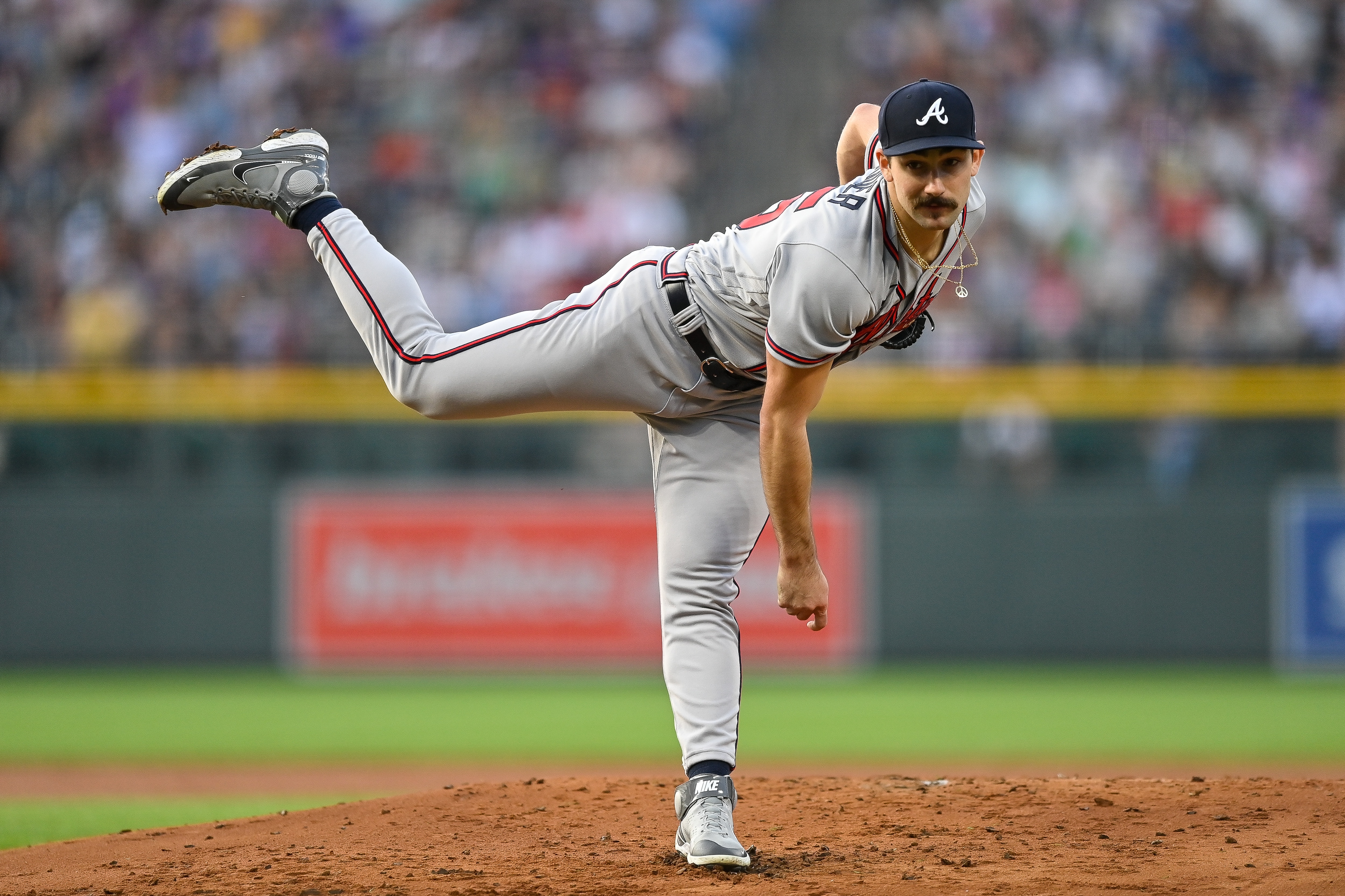 DENVER, CO - JUNE 4: Spencer Strider #65 of the Atlanta Braves pitches against the Colorado Rockies at Coors Field on June 4, 2022 in Denver, Colorado. The Colorado Rockies debuted the team's city connect uniforms in the game. (Photo by Dustin Bradford/Getty Images)