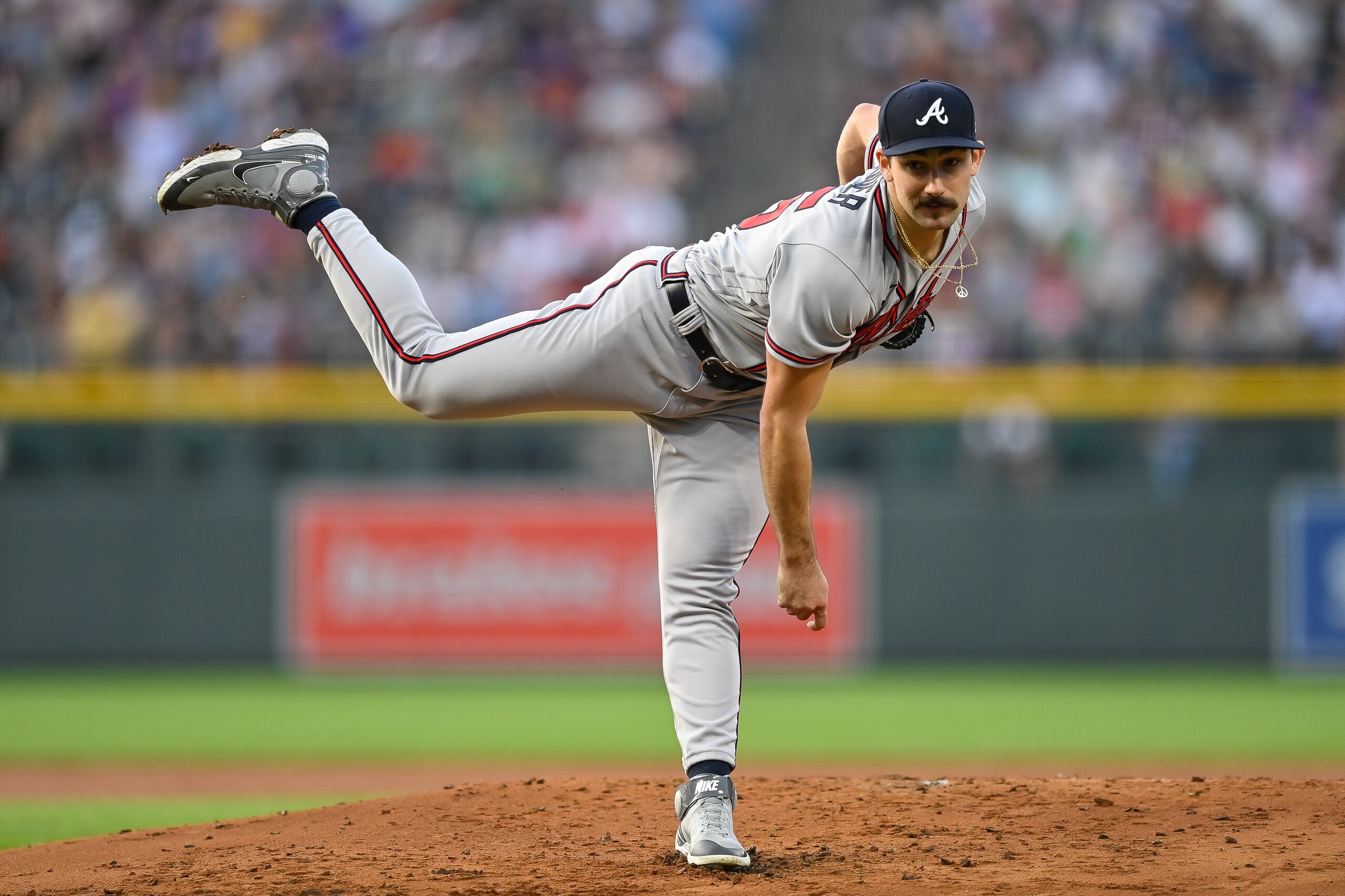 DENVER, CO - JUNE 4: Spencer Strider #65 of the Atlanta Braves pitches against the Colorado Rockies at Coors Field on June 4, 2022 in Denver, Colorado. The Colorado Rockies debuted the team's city connect uniforms in the game. (Photo by Dustin Bradford/Getty Images)