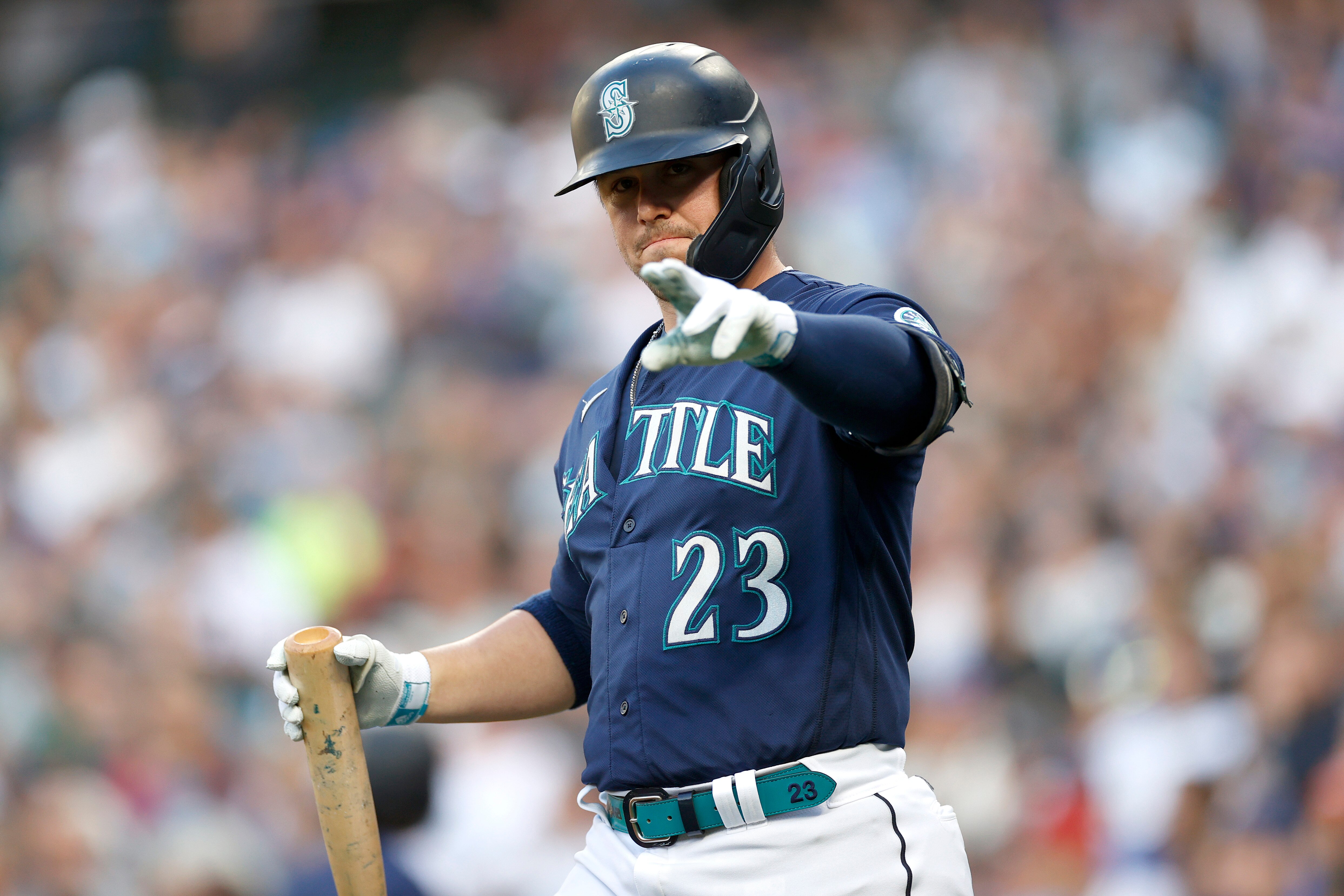 SEATTLE, WASHINGTON - JULY 07: Ty France #23 of the Seattle Mariners reacts during the first inning against the Toronto Blue Jays at T-Mobile Park on July 07, 2022 in Seattle, Washington. (Photo by Steph Chambers/Getty Images)