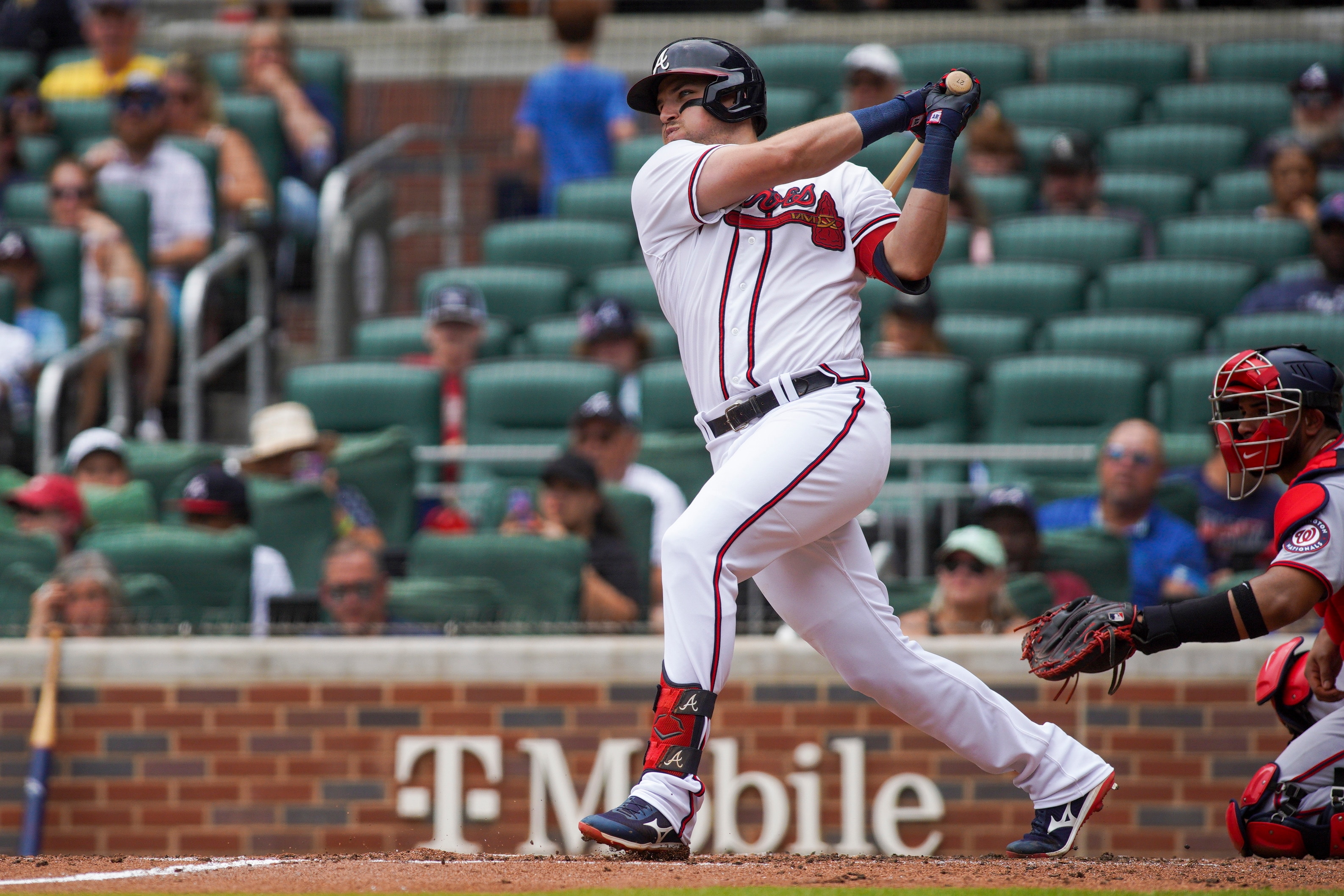 ATLANTA, GA - JULY 10: Austin Riley #27 of the Atlanta Braves hits a RBI single against the Washington Nationals in the third inning at Truist Park on July 10, 2022 in Atlanta, Georgia. (Photo by Brett Davis/Getty Images)