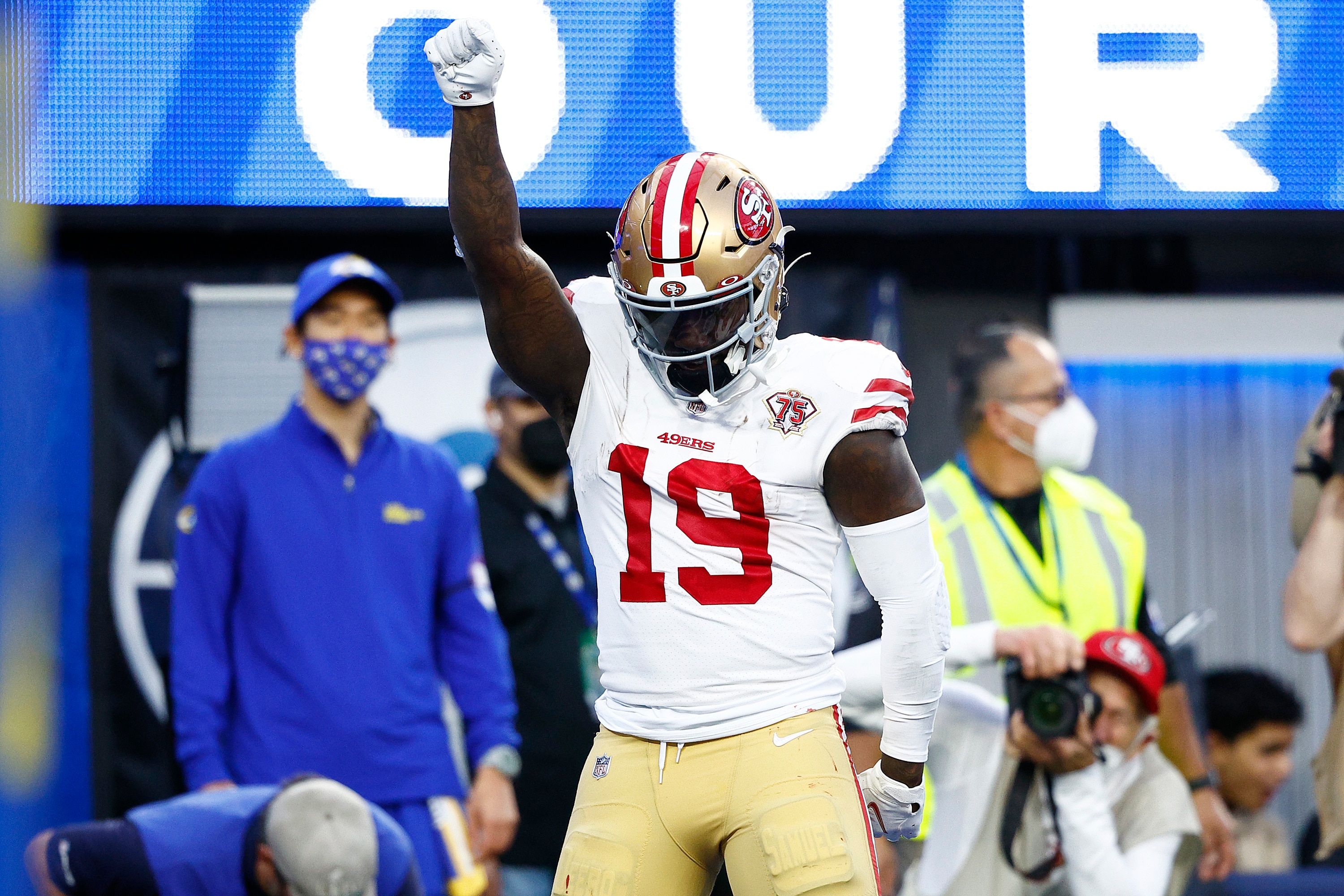 INGLEWOOD, CALIFORNIA - JANUARY 30: Deebo Samuel #19 of the San Francisco 49ers reacts after scoring a touchdown in the second quarter against the Los Angeles Rams in the NFC Championship Game at SoFi Stadium on January 30, 2022 in Inglewood, California. (Photo by Ronald Martinez/Getty Images)
