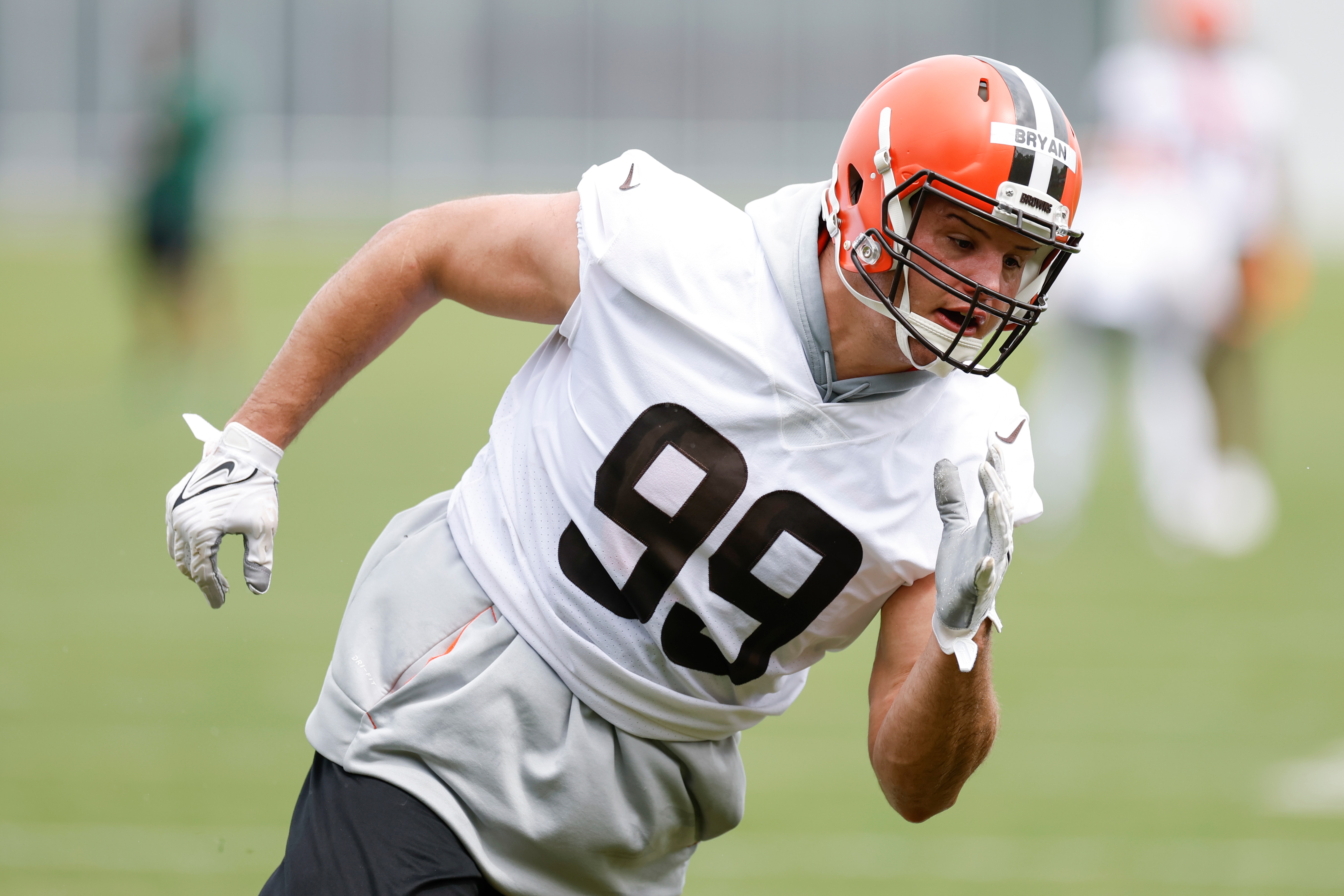 Cleveland Browns' Taven Bryan runs through a drill during an NFL football practice at the team's training facility Wednesday, May 25, 2022, in Berea, Ohio. (AP Photo/Ron Schwane)