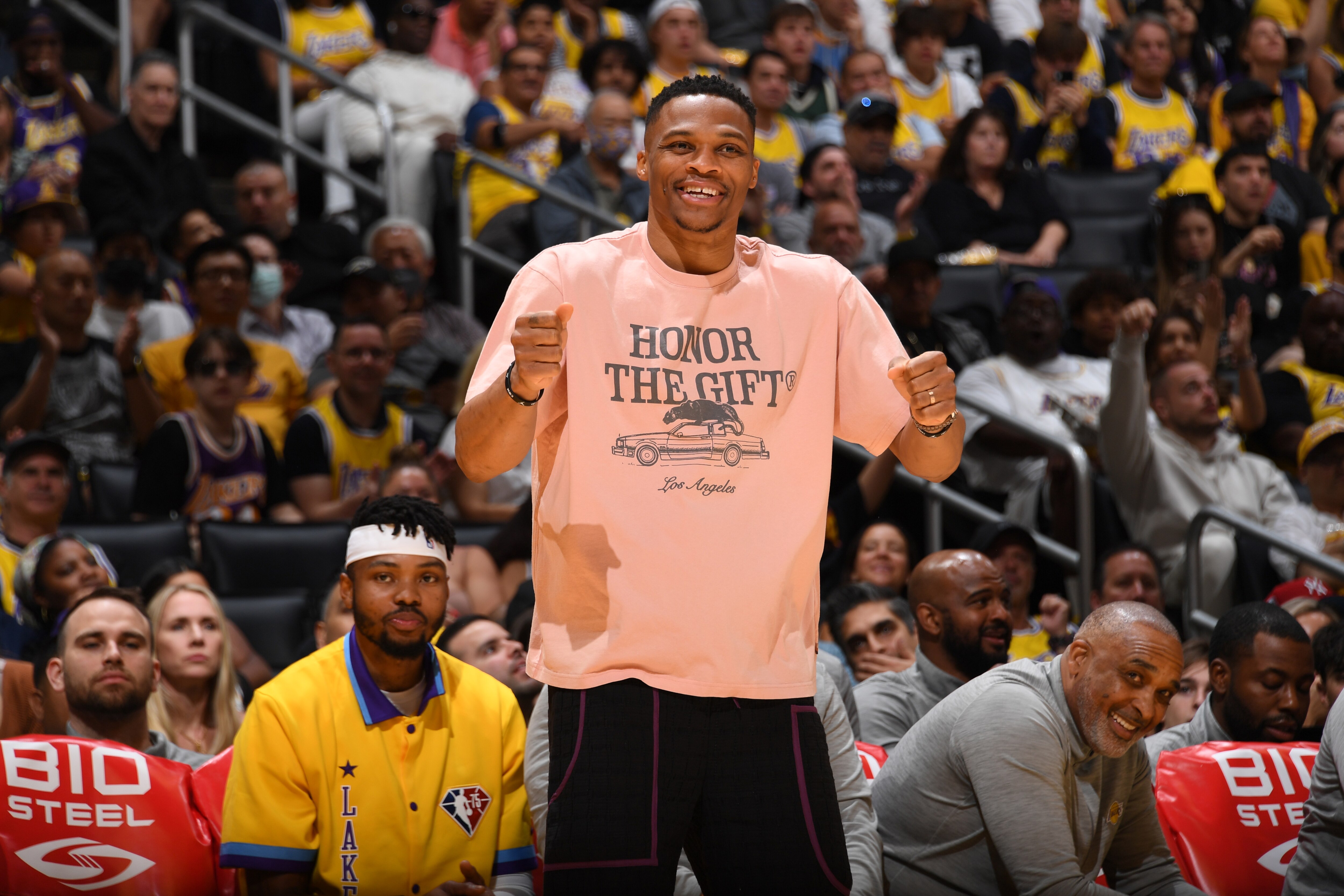 LOS ANGELES, CA - APRIL 8: Russell Westbrook #0 of the Los Angeles Lakers cheers during the game against the Oklahoma City Thunder on April 8, 2022 at Crypto.Com Arena in Los Angeles, California. NOTE TO USER: User expressly acknowledges and agrees that, by downloading and/or using this Photograph, user is consenting to the terms and conditions of the Getty Images License Agreement. Mandatory Copyright Notice: Copyright 2022 NBAE (Photo by Adam Pantozzi/NBAE via Getty Images)