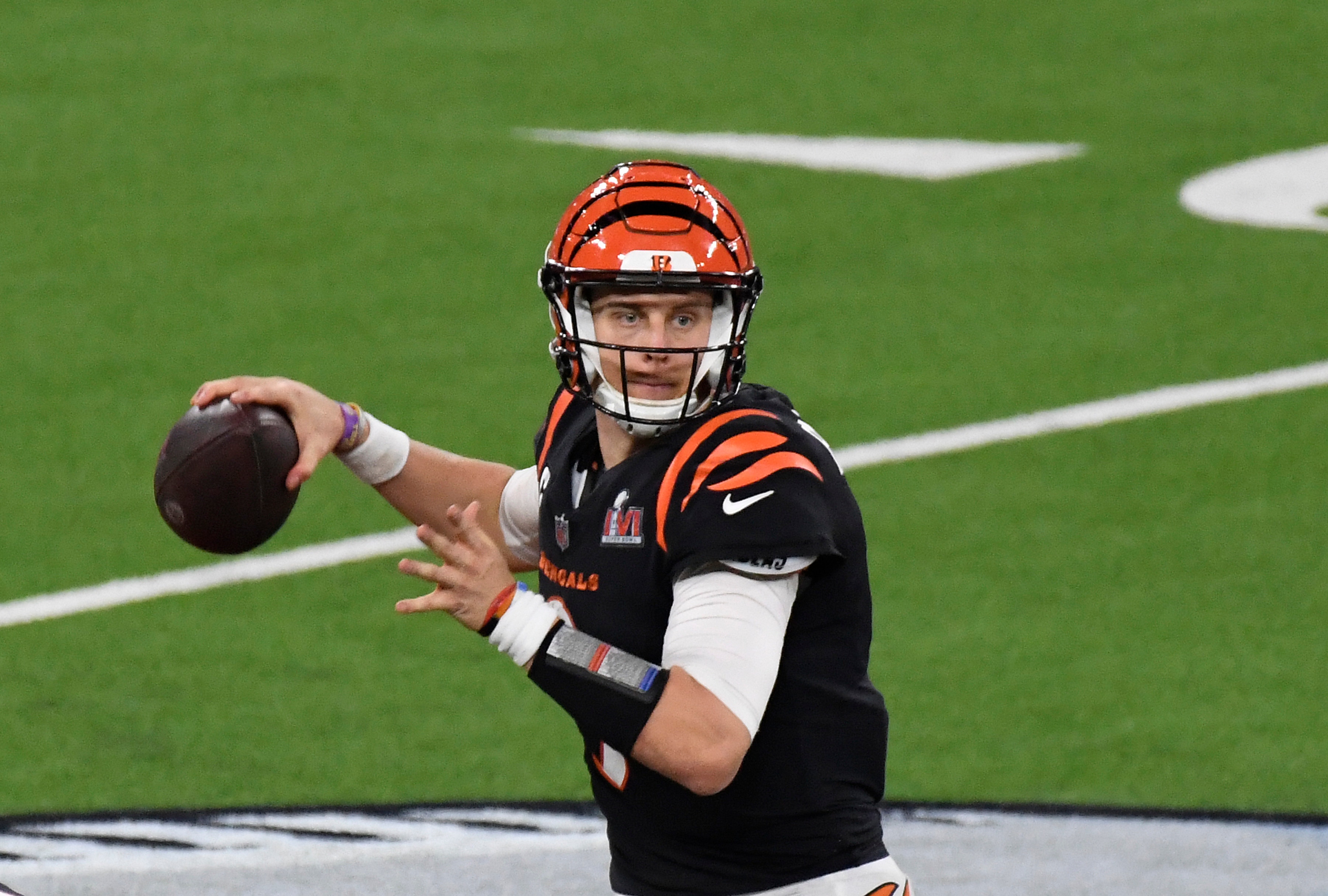 INGLEWOOD, CALIFORNIA - FEBRUARY 13: Joe Burrow #9 of the Cincinnati Bengals looks to pass against the Los Angeles Rams during Super Bowl LVI at SoFi Stadium on February 13, 2022 in Inglewood, California. (Photo by Focus on Sport/Getty Images)