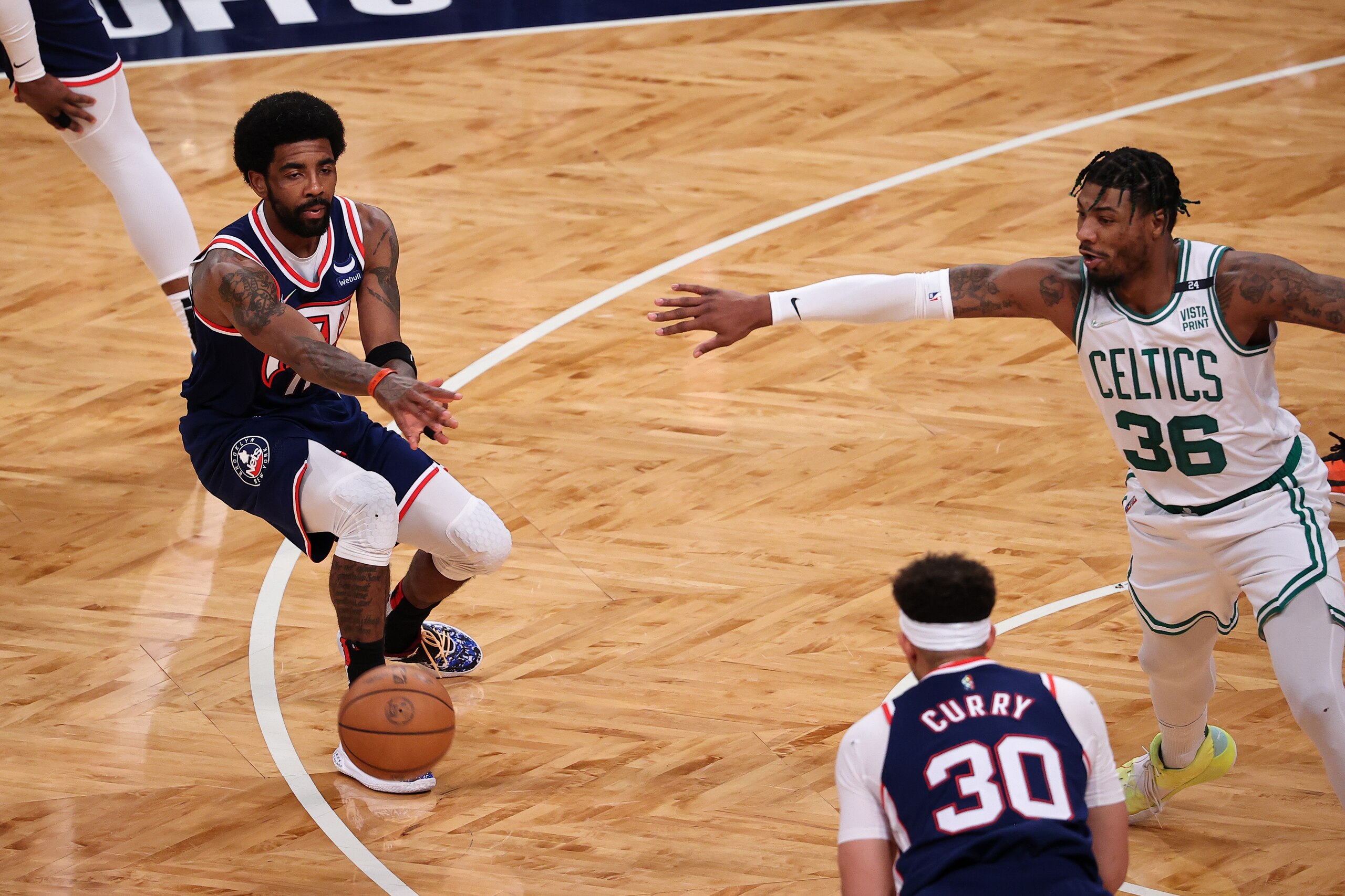 NEW YORK, NY - APRIL 25: Kyrie Irving, Seth Curry of Brooklyn Nets and Marcus Smart of Boston Celtics in action during NBA playoffs between Brooklyn Nets and Boston Celtics at the Barclays Center in Brooklyn of New York City, United States on April 25, 2022. (Photo by Tayfun Coskun/Anadolu Agency via Getty Images)