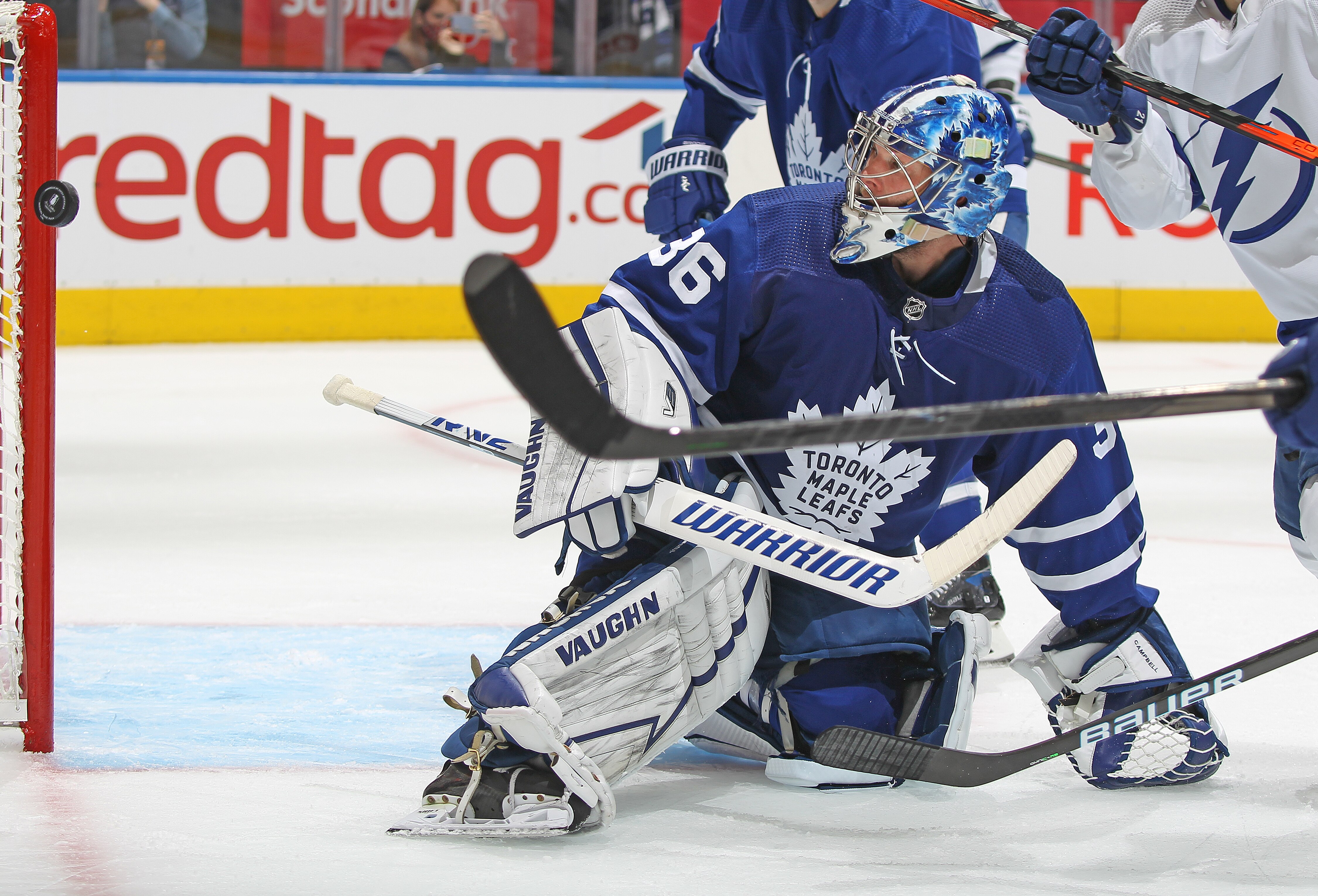 TORONTO, ON - MAY 14:  Jack Campbell #36 of the Toronto Maple Leafs looks back to see a puck just miss beating him against the Tampa Bay Lightning during Game Seven of the First Round of the 2022 Stanley Cup Playoffs at Scotiabank Arena on May 14, 2022 in Toronto, Ontario, Canada. ( Photo by Claus Andersen/Getty images)
