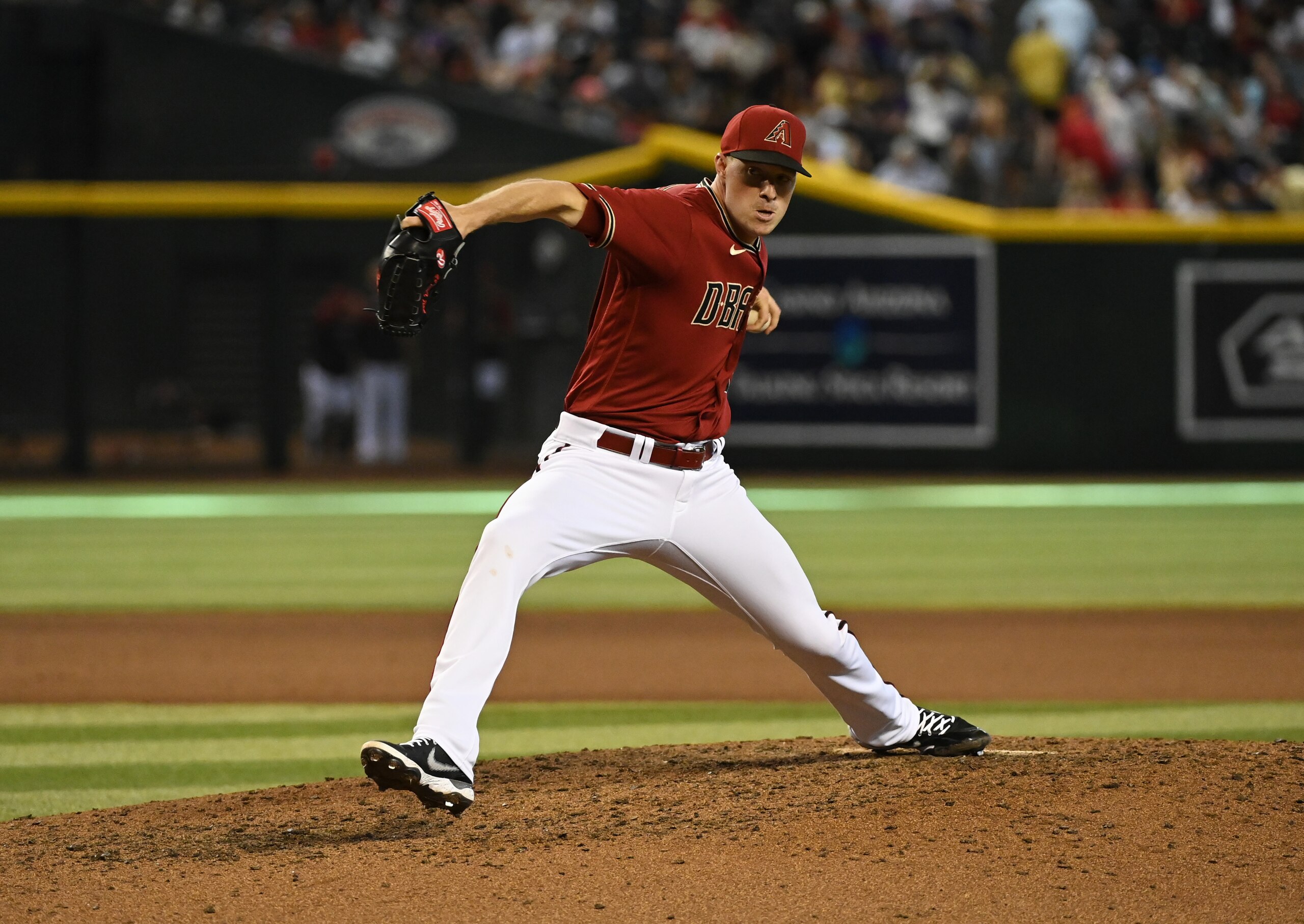 PHOENIX, ARIZONA - JULY 10: Joe Mantiply #35 of the Arizona Diamondbacks delivers an eighth inning pitch against the Colorado Rockies at Chase Field on July 10, 2022 in Phoenix, Arizona. (Photo by Norm Hall/Getty Images) PHOENIX, ARIZONA - JULY 10: Joe Mantiply #35 of the Arizona Diamondbacks delivers an eighth inning pitch against the Colorado Rockies at Chase Field on July 10, 2022 in Phoenix, Arizona. (Photo by Norm Hall/Getty Images)